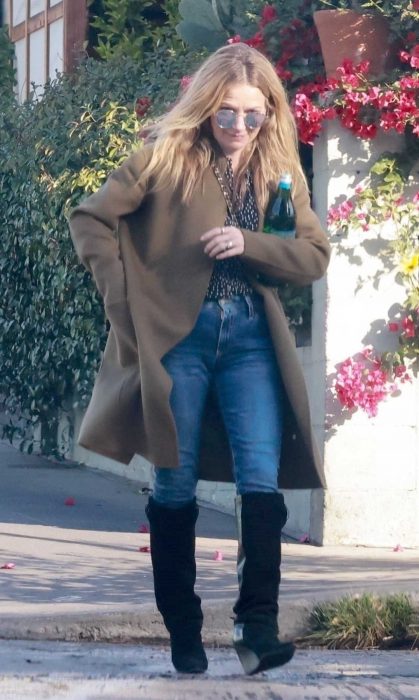 Becki Newton in a Tan Coat