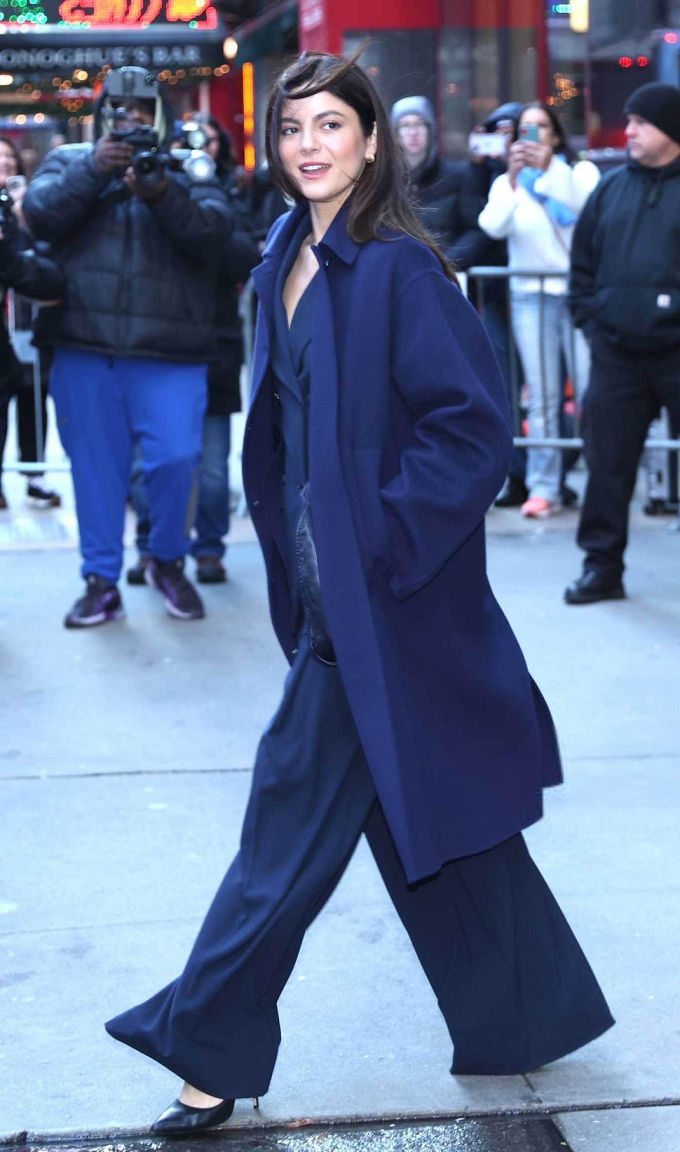 Monica Barbaro in a Blue Coat Arrives at Good Morning America in New York 12/12/2024