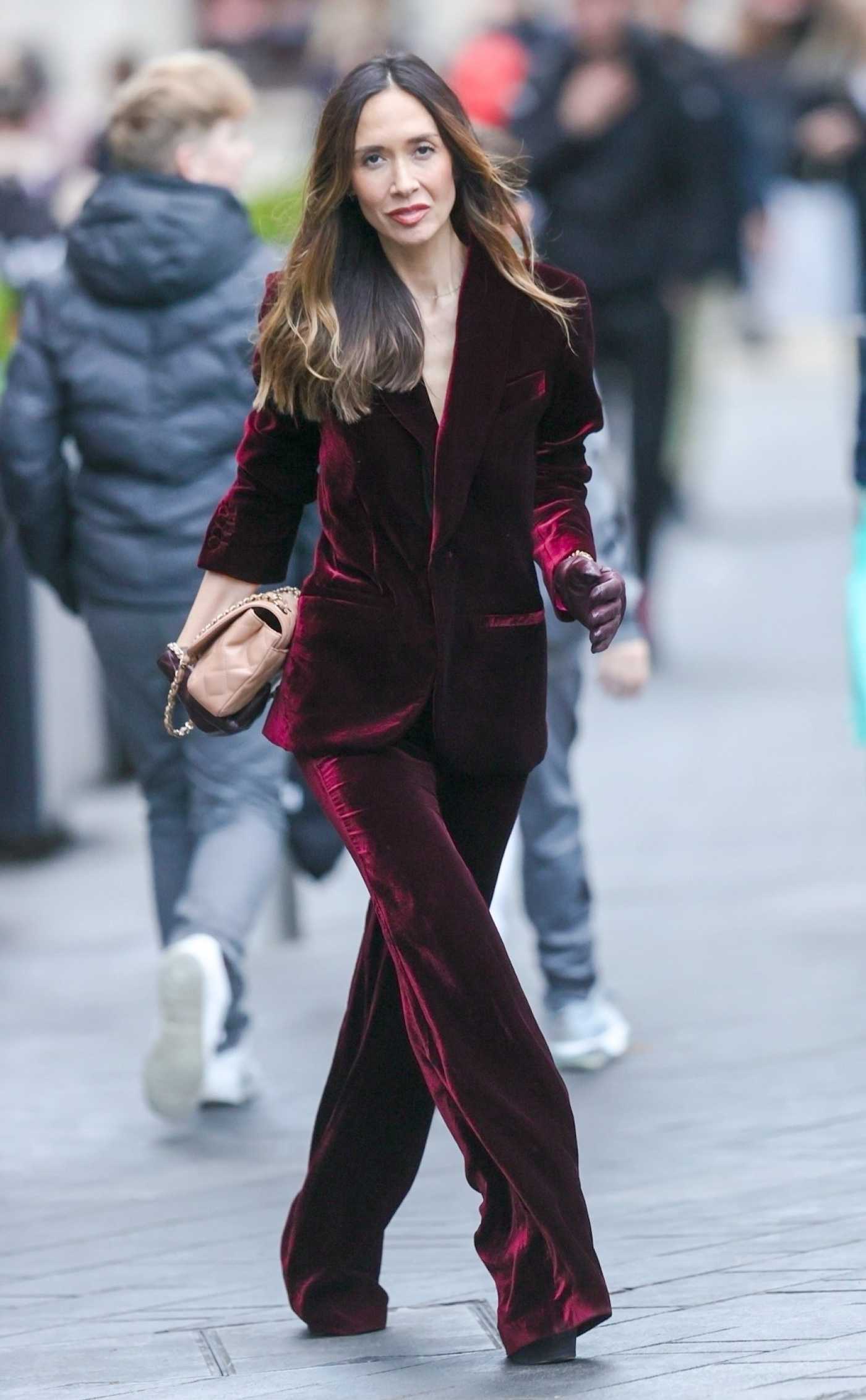 Myleene Klass in a Burgundy Trouser Suit Arrives at the Smooth Radio in London 11/30/2024