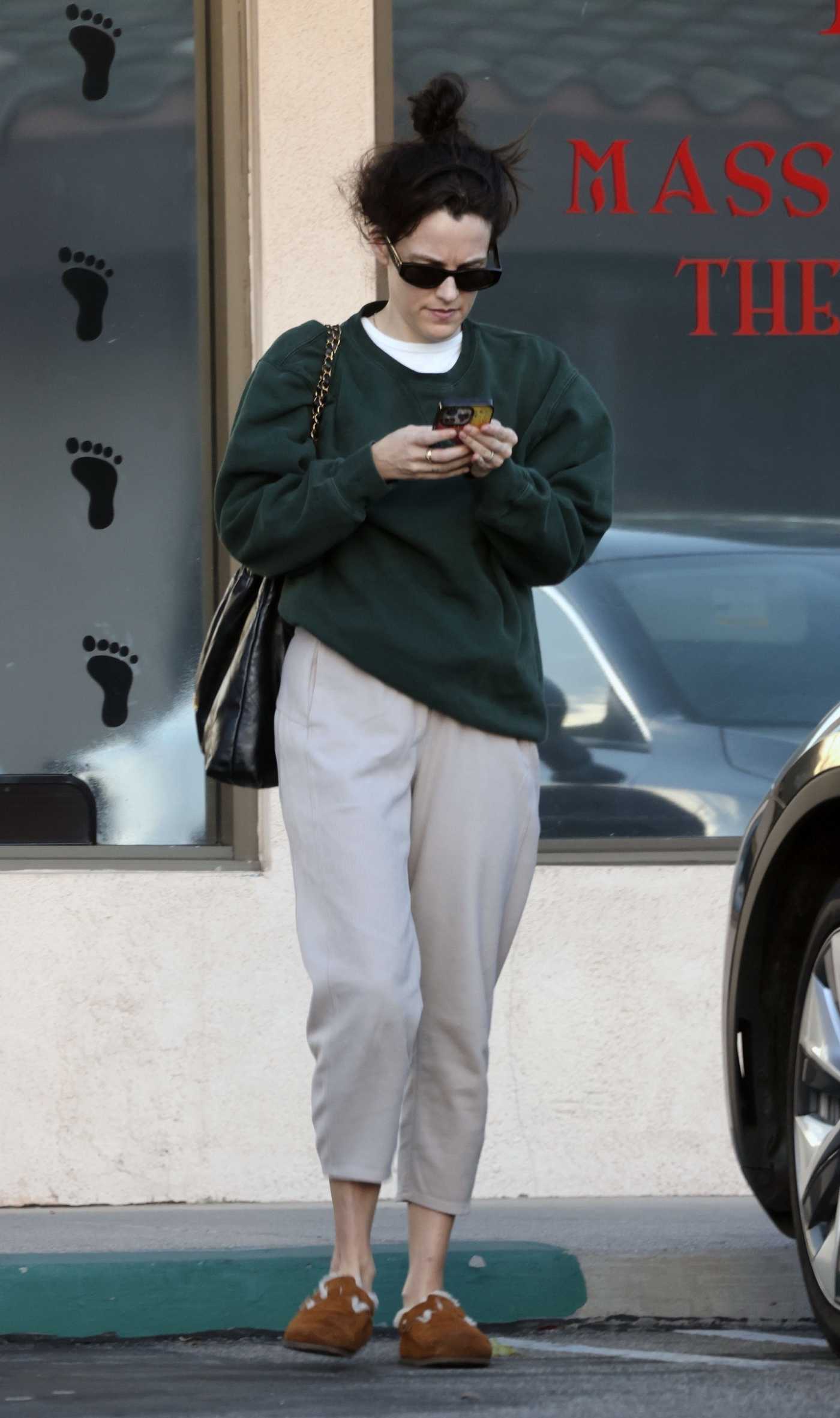 Riley Keough in a Green Sweatshirt Leaves Wellness Spa in Westlake 12/16/2024