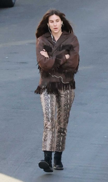 Scout Willis in a Snakeskin Print Pants