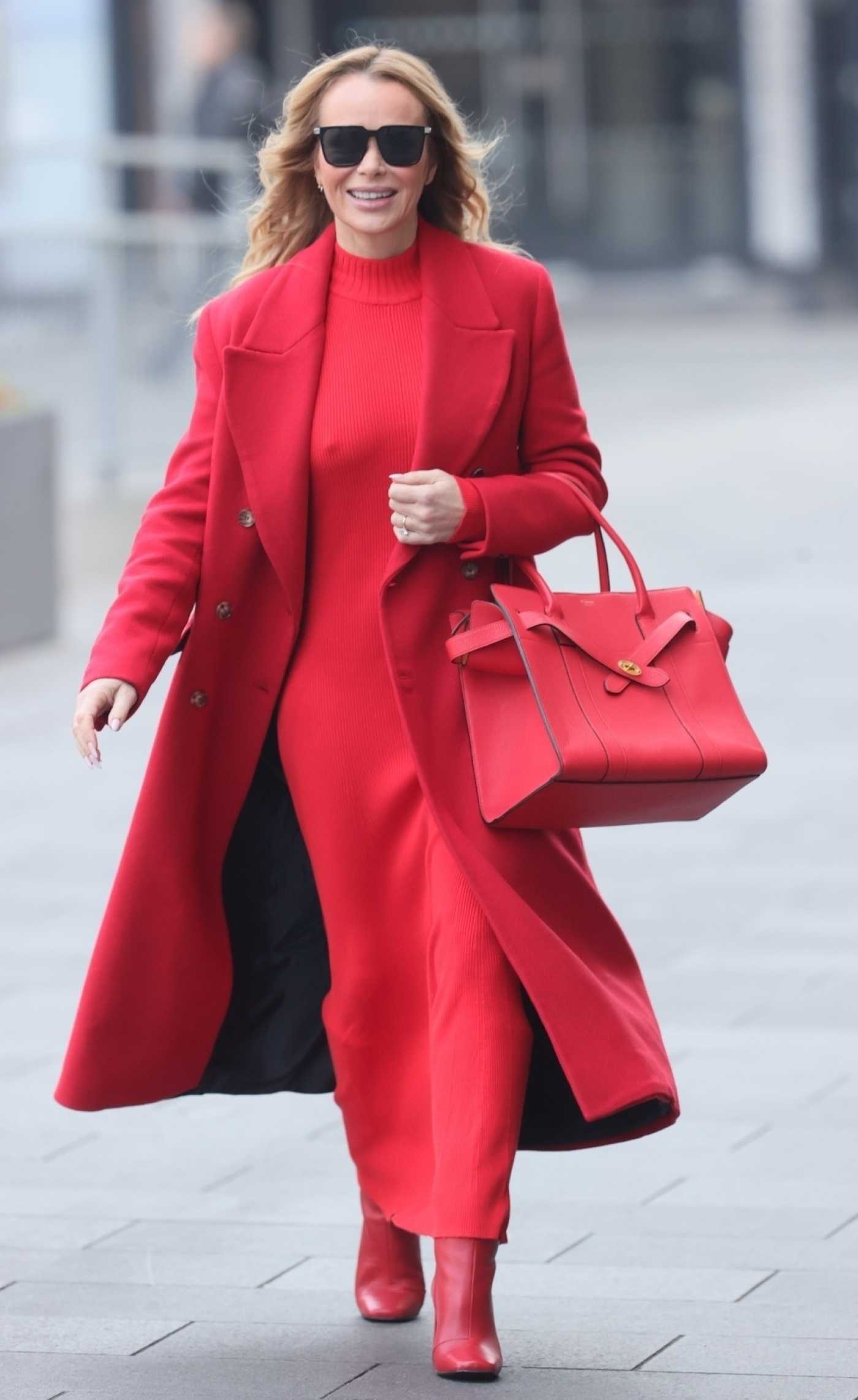 Amanda Holden in a Red Dress Leaves the Heart Radio in London 01/21/2025