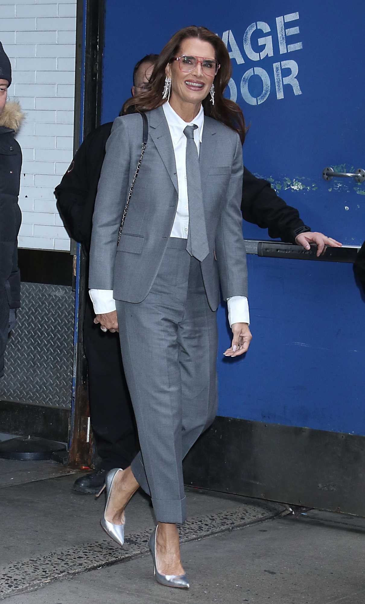 Brooke Shields in a Grey Pantsuit Leaves the Good Morning America in New York City 01/13/2025