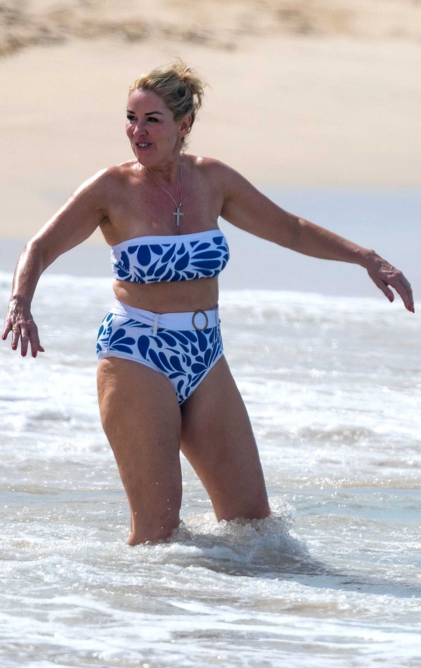 Claire Sweeney in a Blue Bikini on the Beach in Barbados 12/30/2024