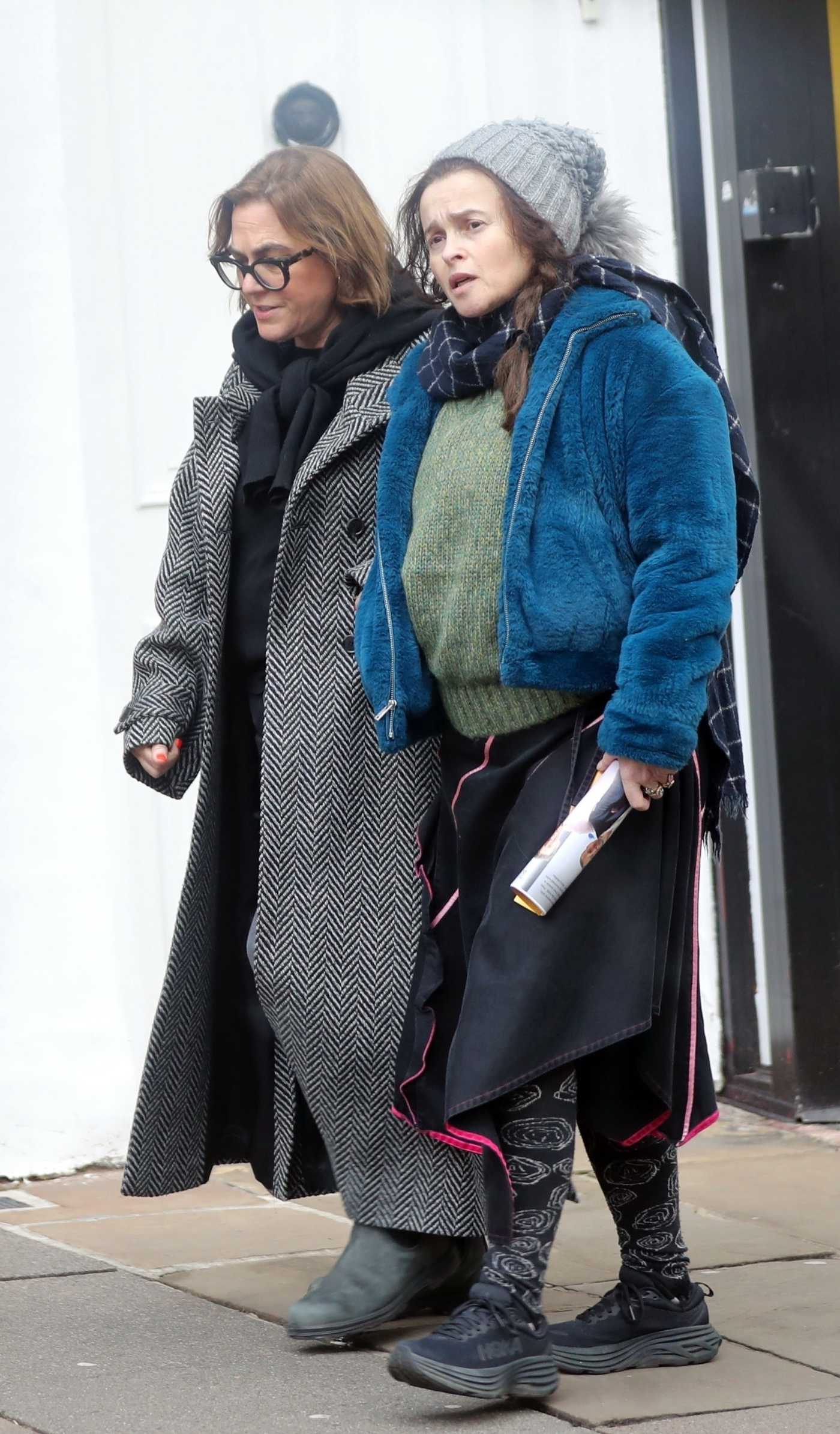 Helena Bonham Carter in a Grey Beanie Hat Was Seen Out with a Friend in London 01/17/2025