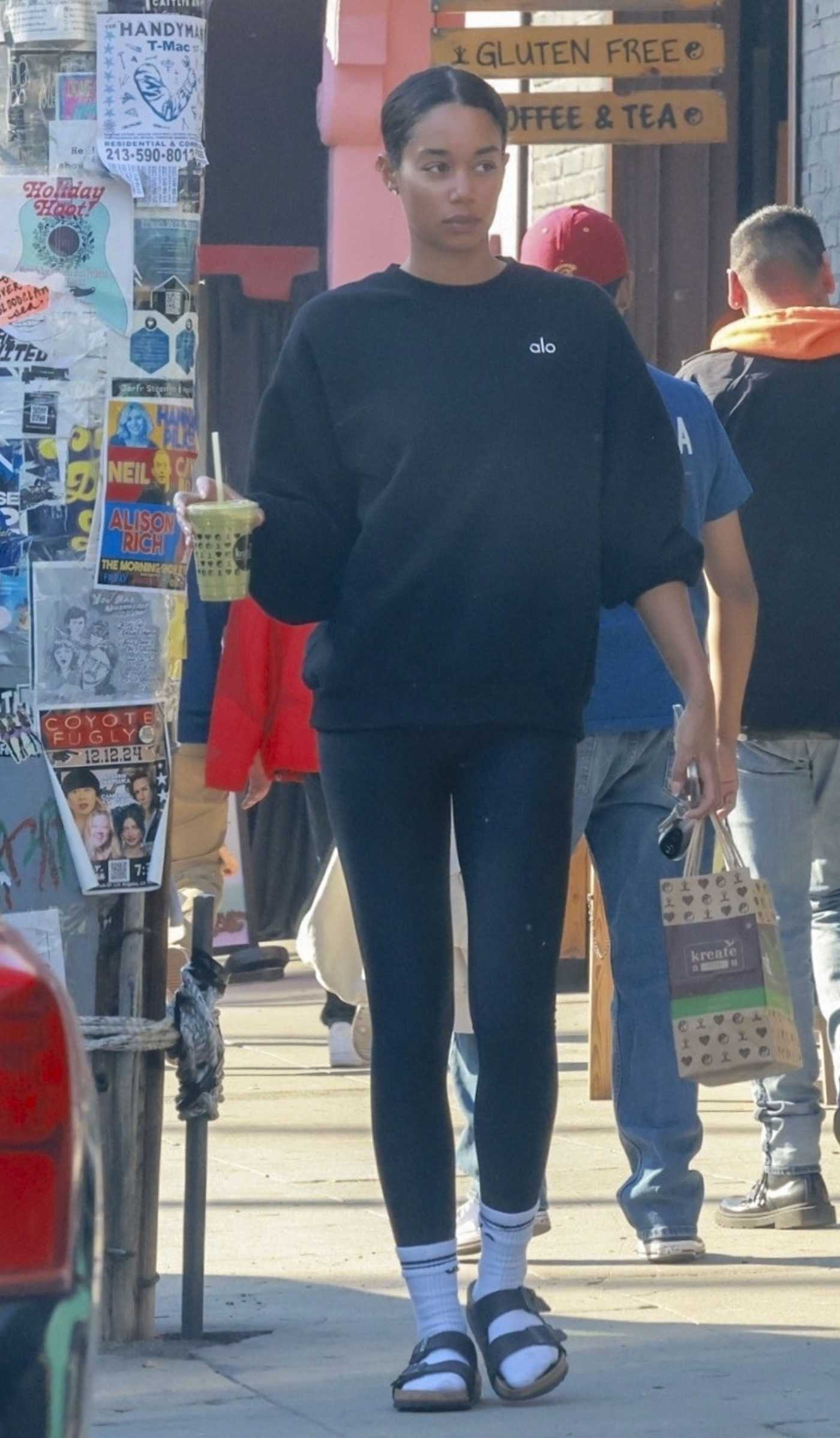 Laura Harrier in a Black Sweatshirt Picking Up Juice in Los Feliz 01/11/2025