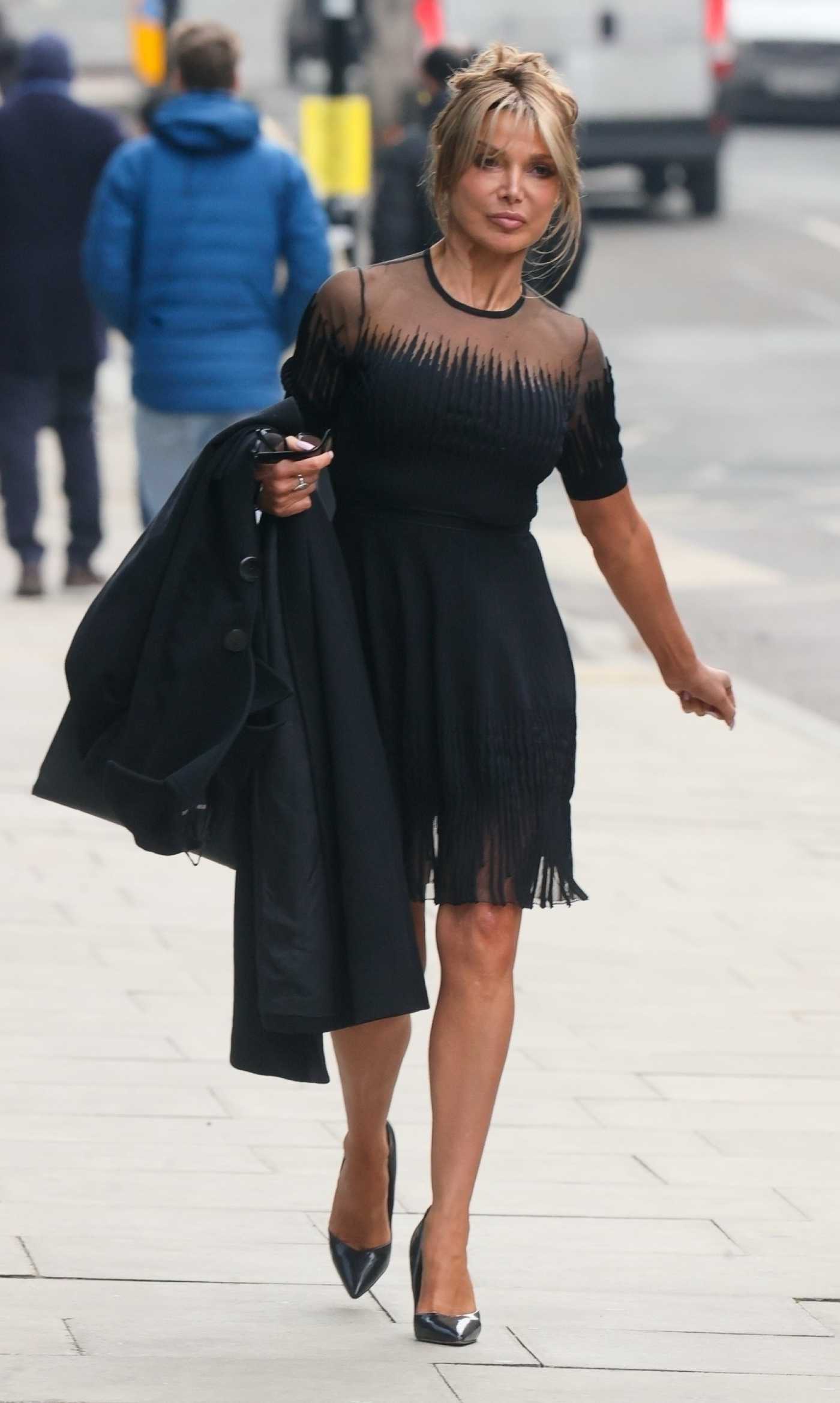 Lizzie Cundy in a Black Dress Heads to Paul Danan Funeral in East London 01/21/2025