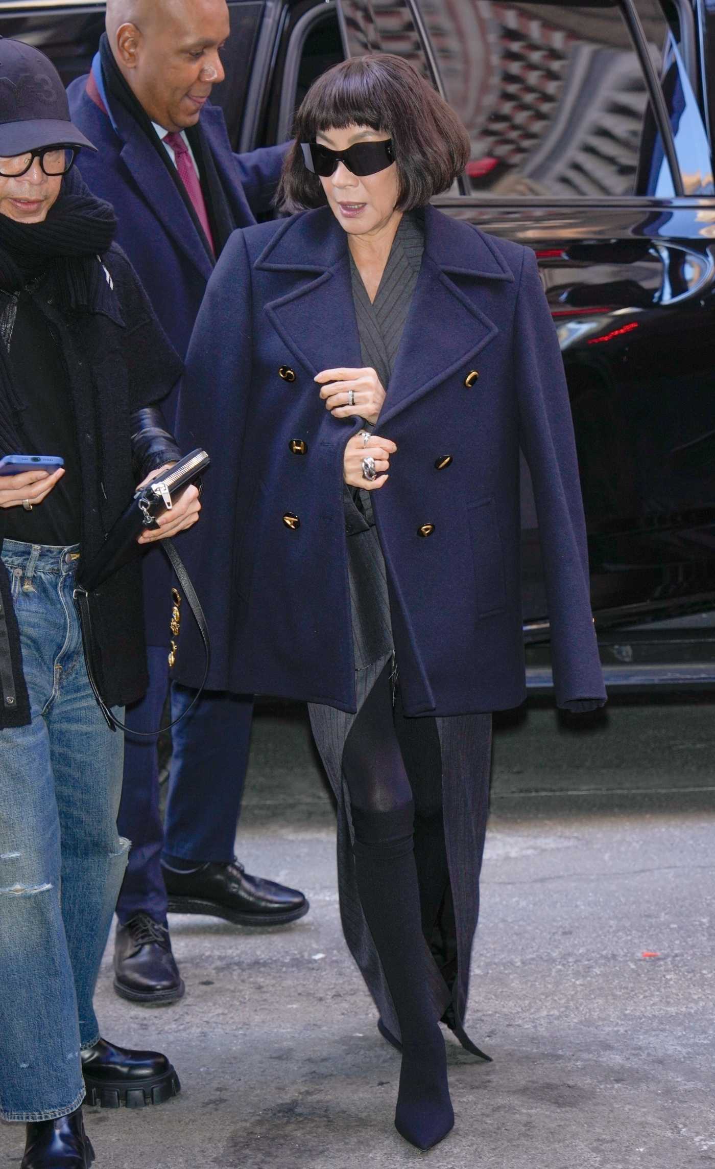 Michelle Yeoh in a Navy Jacket Arrives at the Empire State Building in New York 01/24/2025