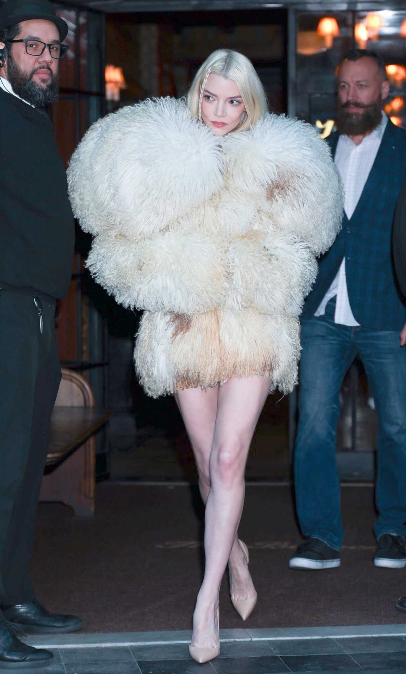 Anya Taylor-Joy in a Beige Faux Fur Coat Was Seen Out in East Village in New York City 02/04/2025