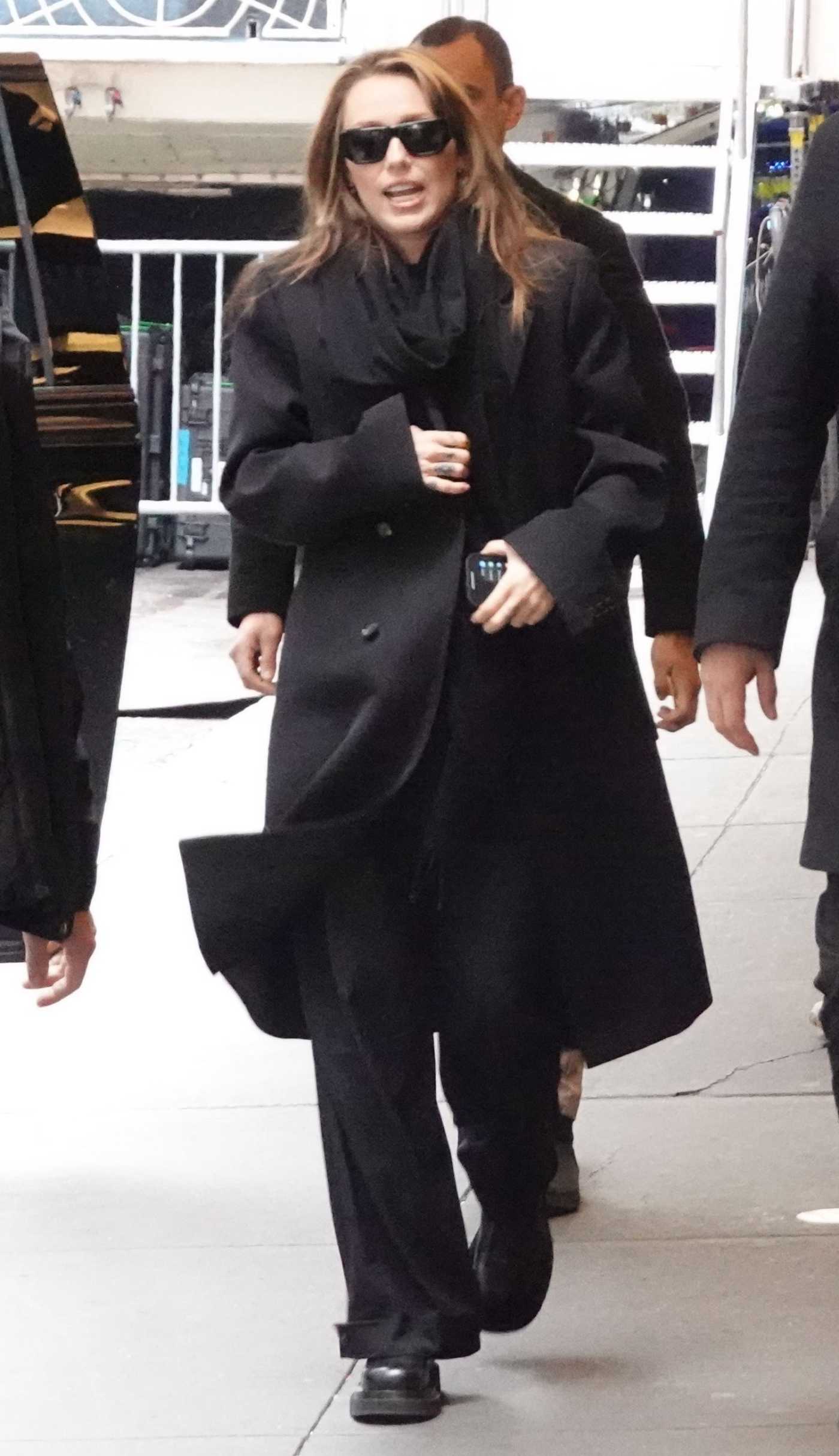 Miley Cyrus in a Black Coat Arrives for Rehearsals Ahead of SNL 50: The Anniversary Special Concert in New York City 02/12/2025