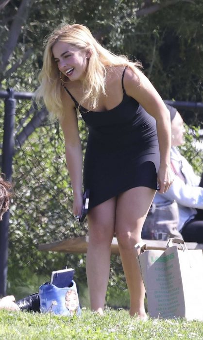 Addison Rae in a Sheer Black Mini Dress