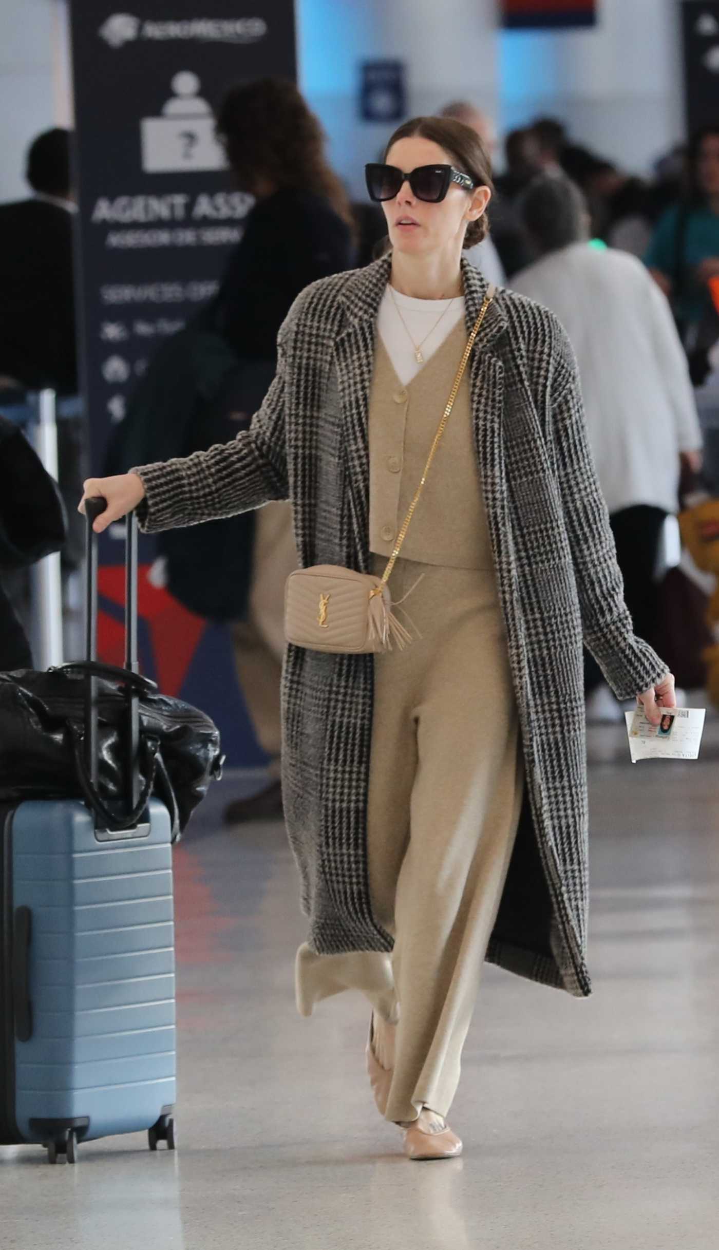 Ashley Greene in a Grey Coat Arrives at LAX Airport in Los Angeles 01/21/2025