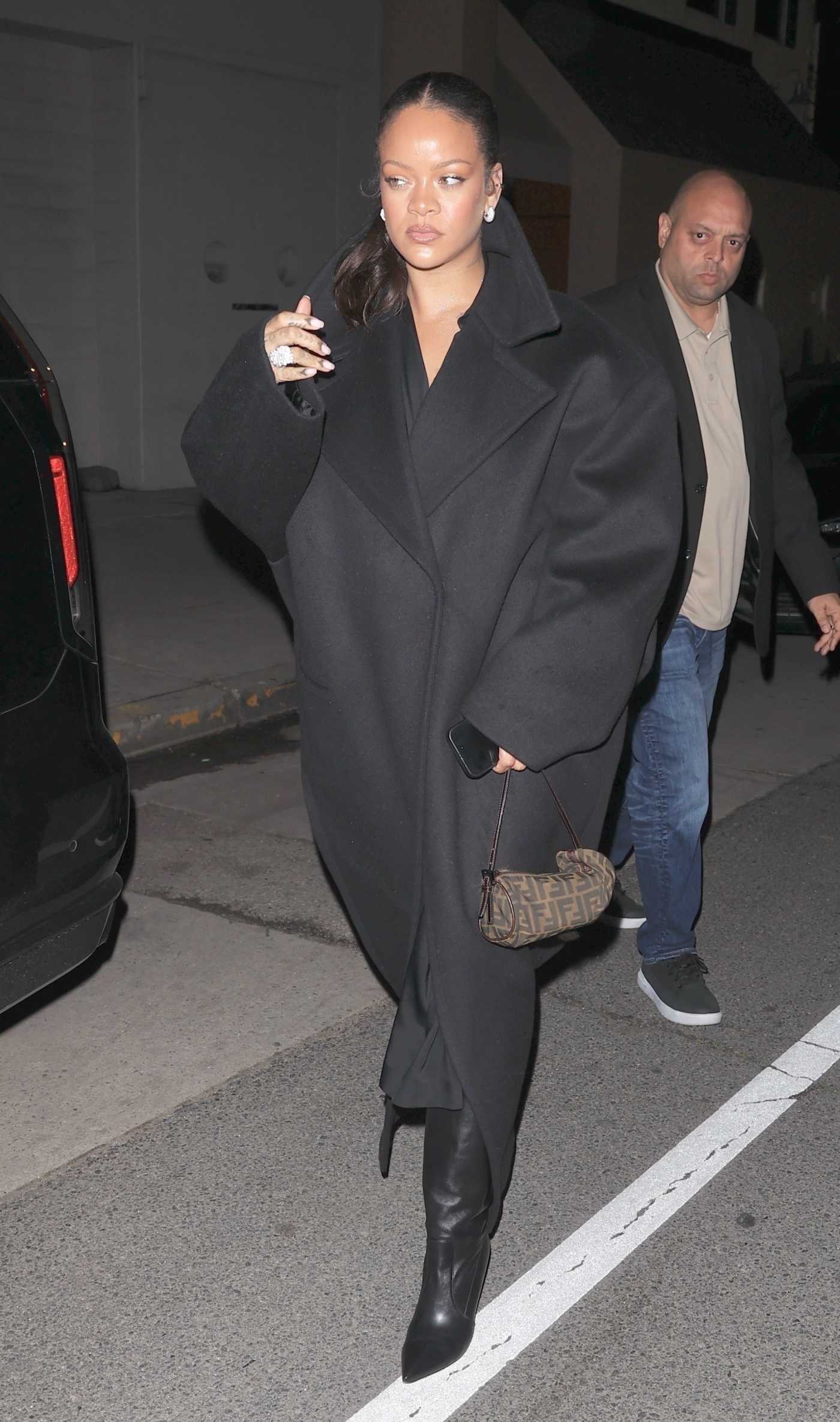 Rihanna in a Black Coat Arrives for a Late Night Dinner at Giorgio Baldi in Santa Monica 03/07/2025