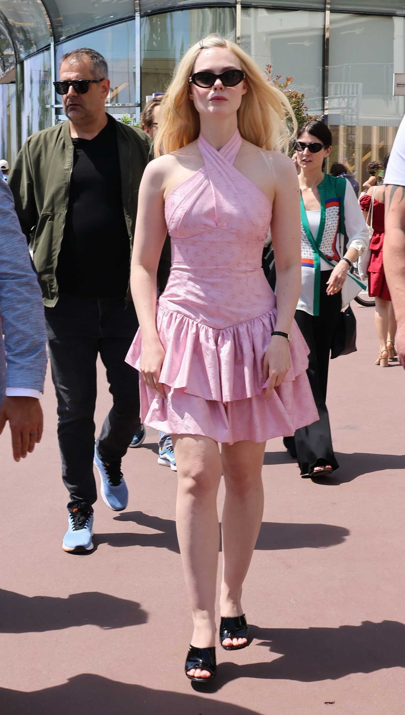 Elle Fanning in a Pink Dress Was Seen Out in Cannes 05/21/2025