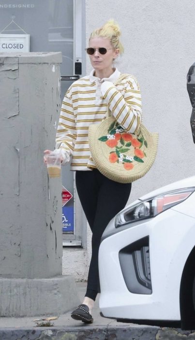 Kate Mara in a Black Leggings