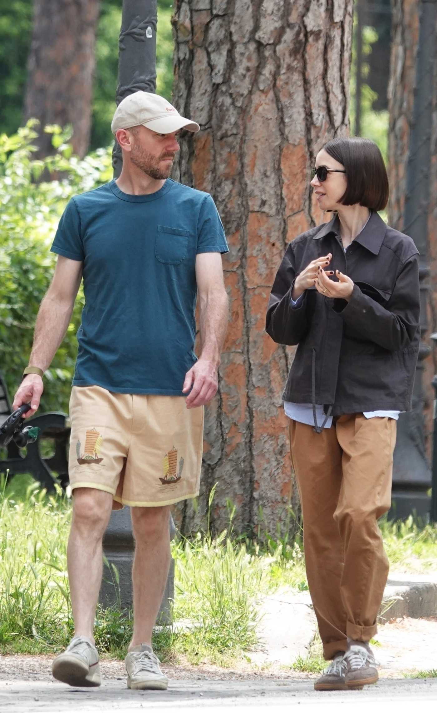 Lily Collins in a Black Jacket Enjoying a Stroll with Her Husband in Rome 05/13/2025