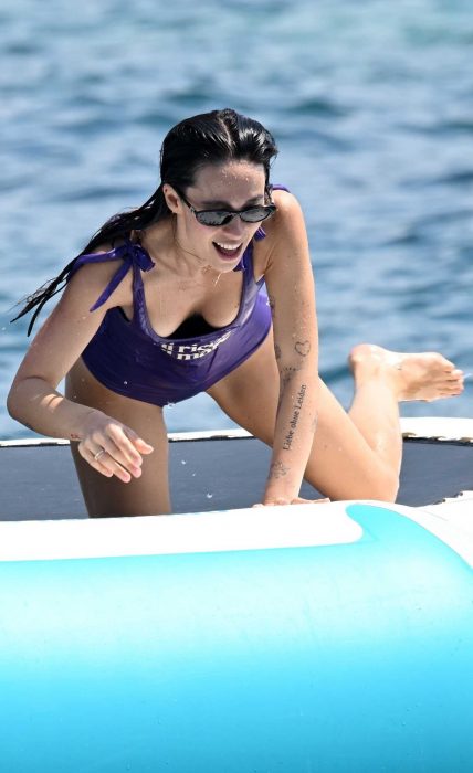 Aurora Ramazzotti in a Purple Swimsuit