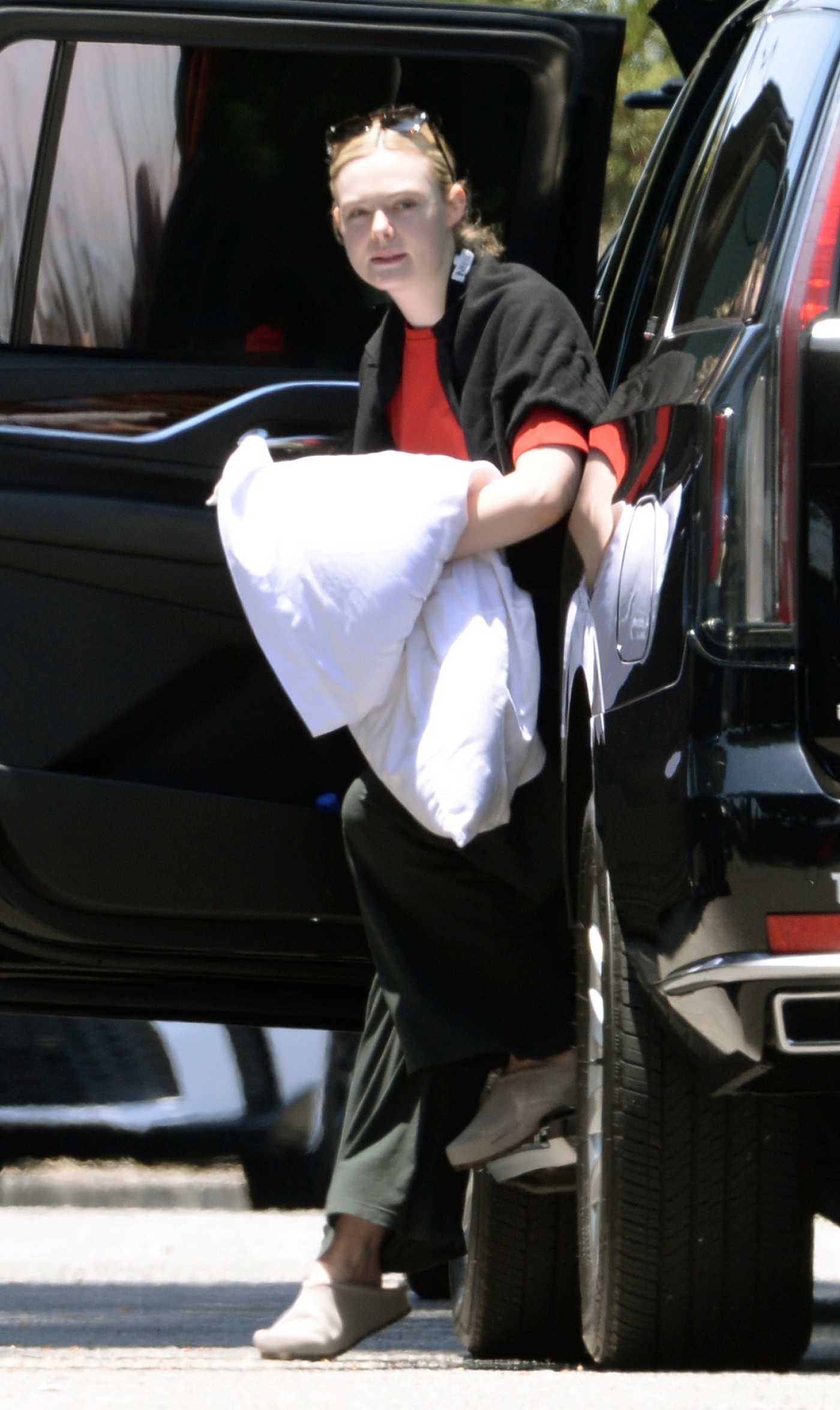 Elle Fanning in a Red Tee Was Seen Out in Los Angeles 06/02/2025