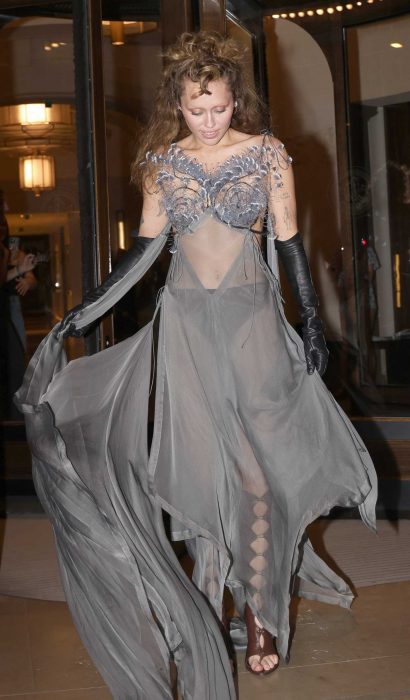 Miley Cyrus in a Grey See-Through Dress