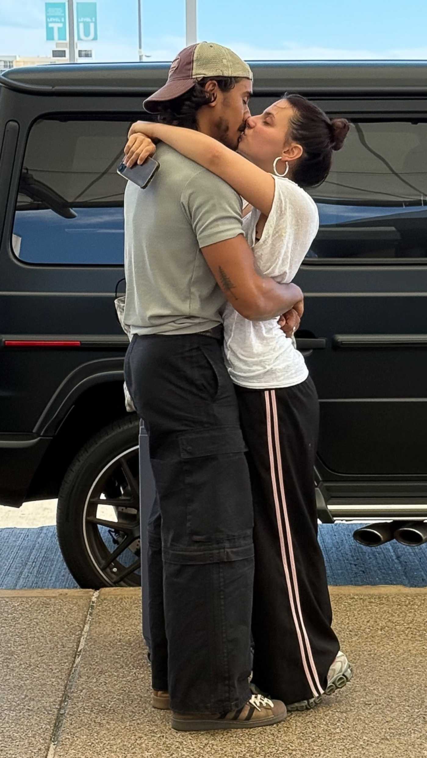Dafne Keen in a Black Track Pants Shares a PDA Goodbye with Michael Cimino After Attending 2025 Comic-Con International in San Diego 07/28/2025
