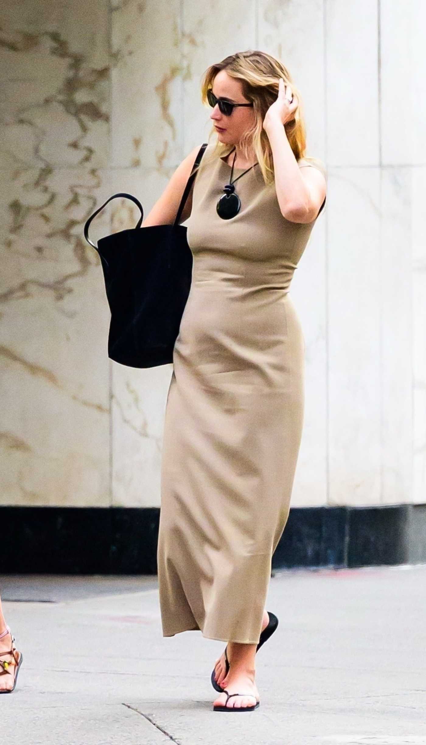 Jennifer Lawrence in a Beige Dress Was Seen Out in New York City 07/22/2025