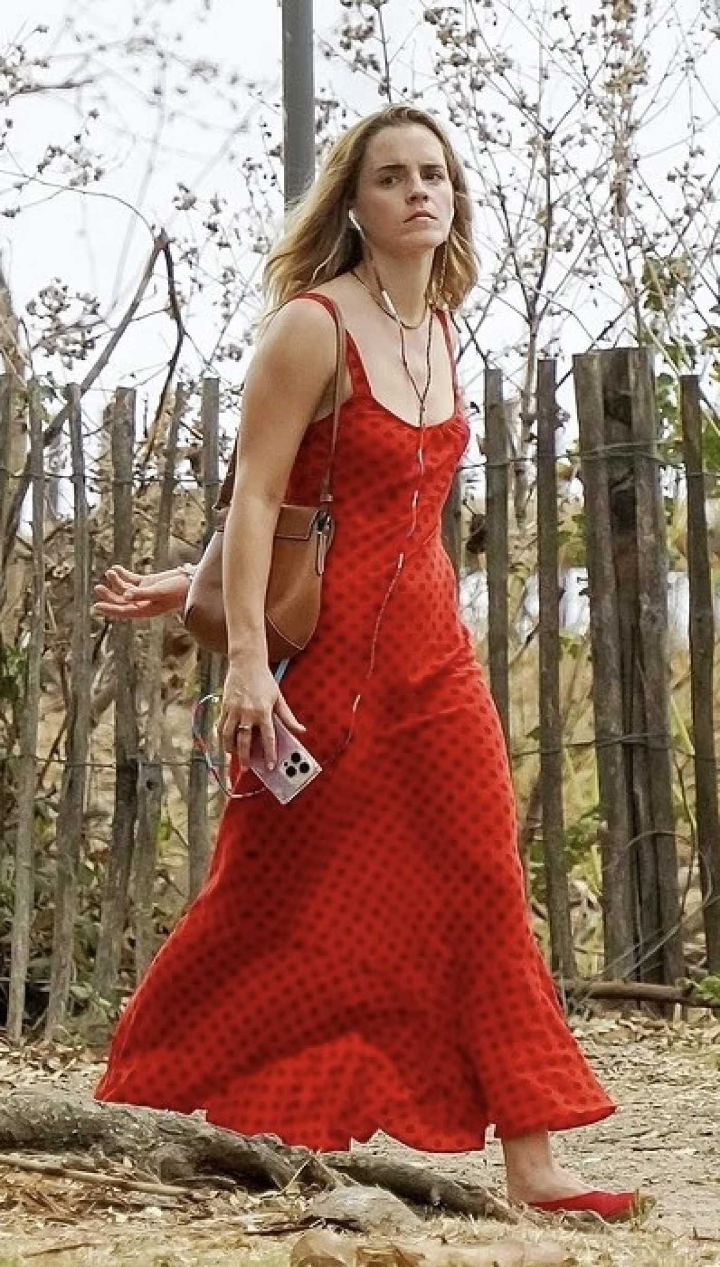 Emma Watson in a Red Dress Was Seen Out for a Stroll in Saint Tropez 08/28/2025