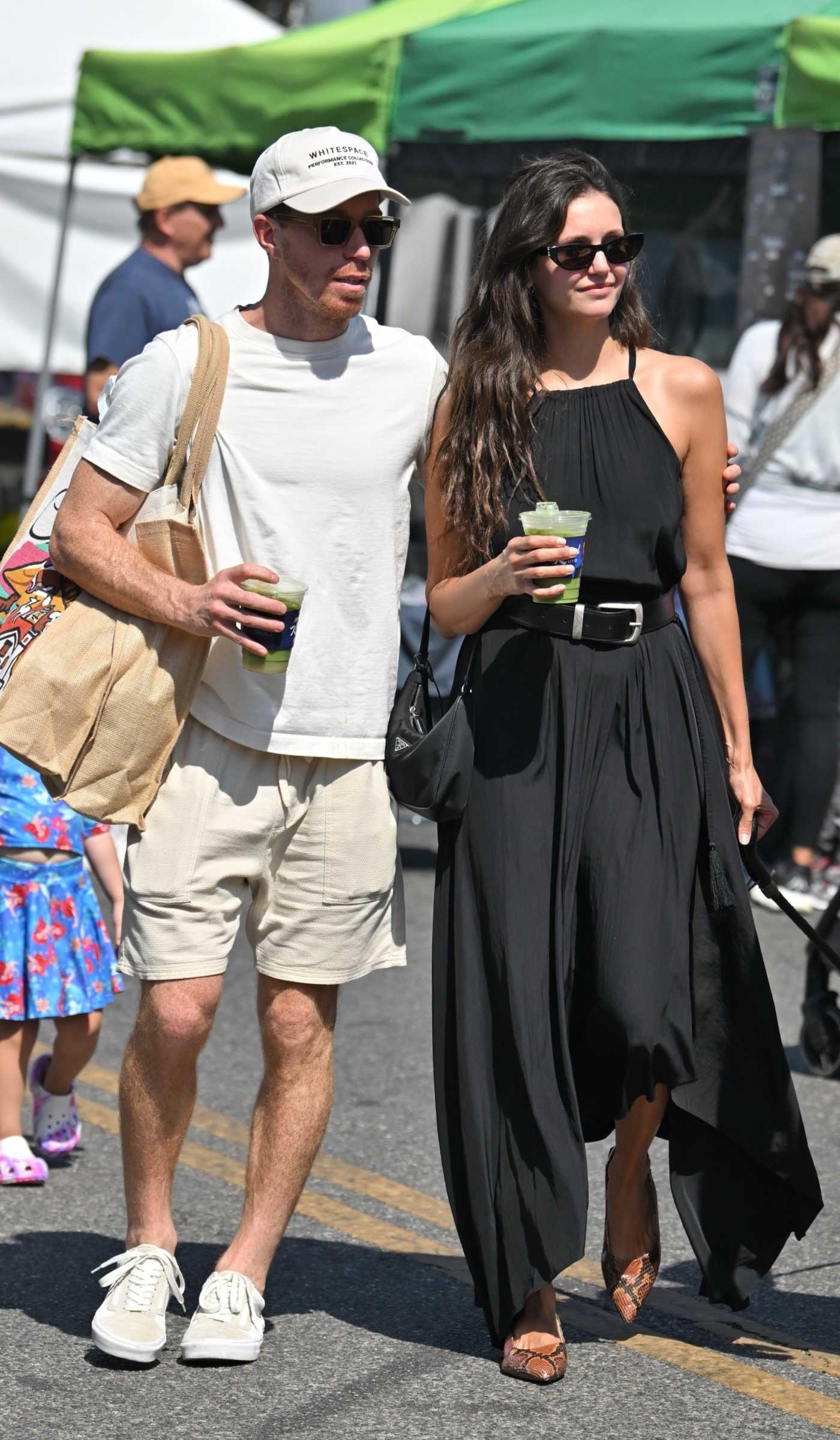Nina Dobrev in a Black Dress Shops with Shaun White at the Farmers Market in Studio City 08/24/2025