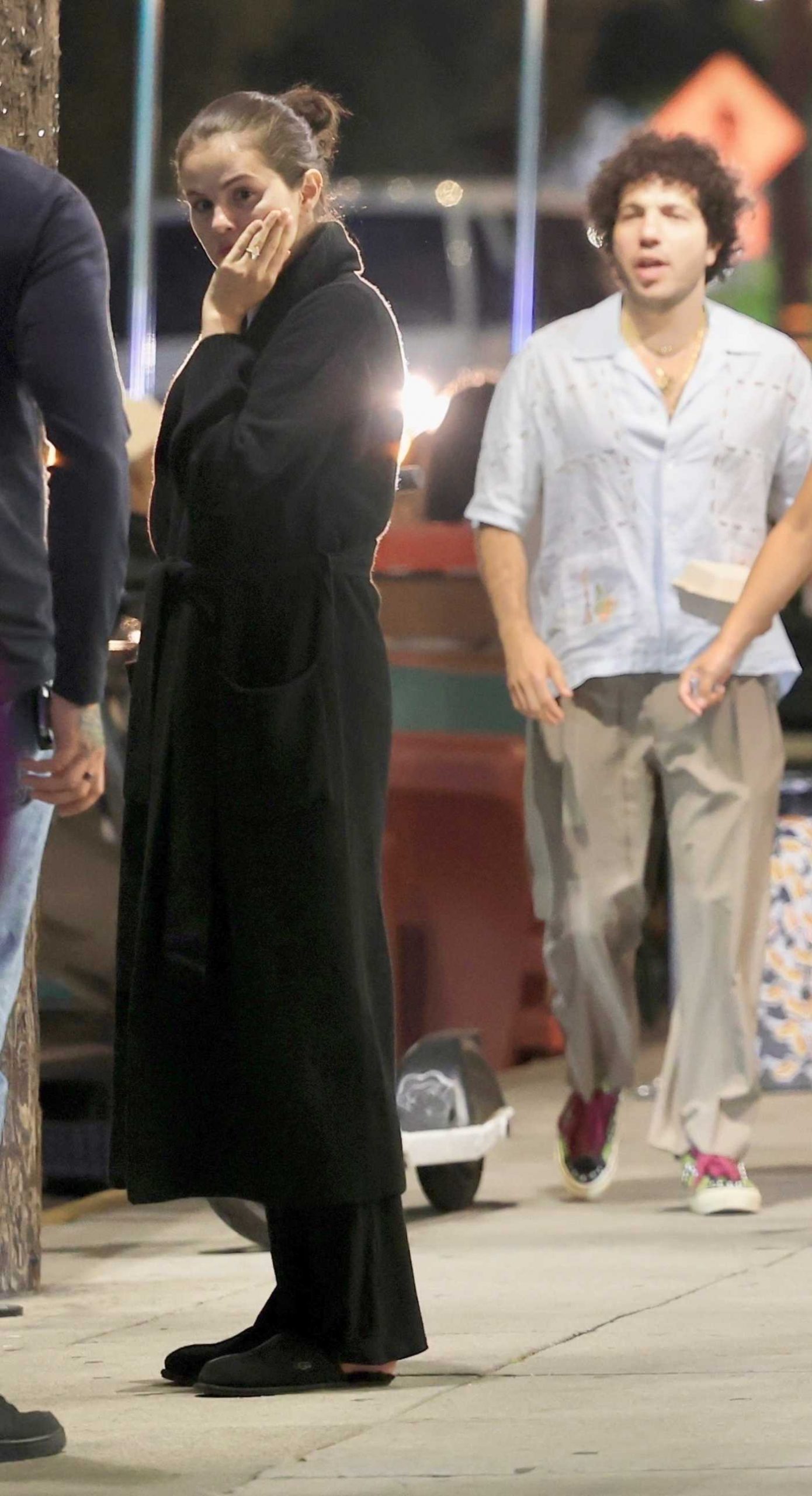 Selena Gomez in a Black Coat Out for Dinner with Benny Blanco in Los Angeles 08/15/2025