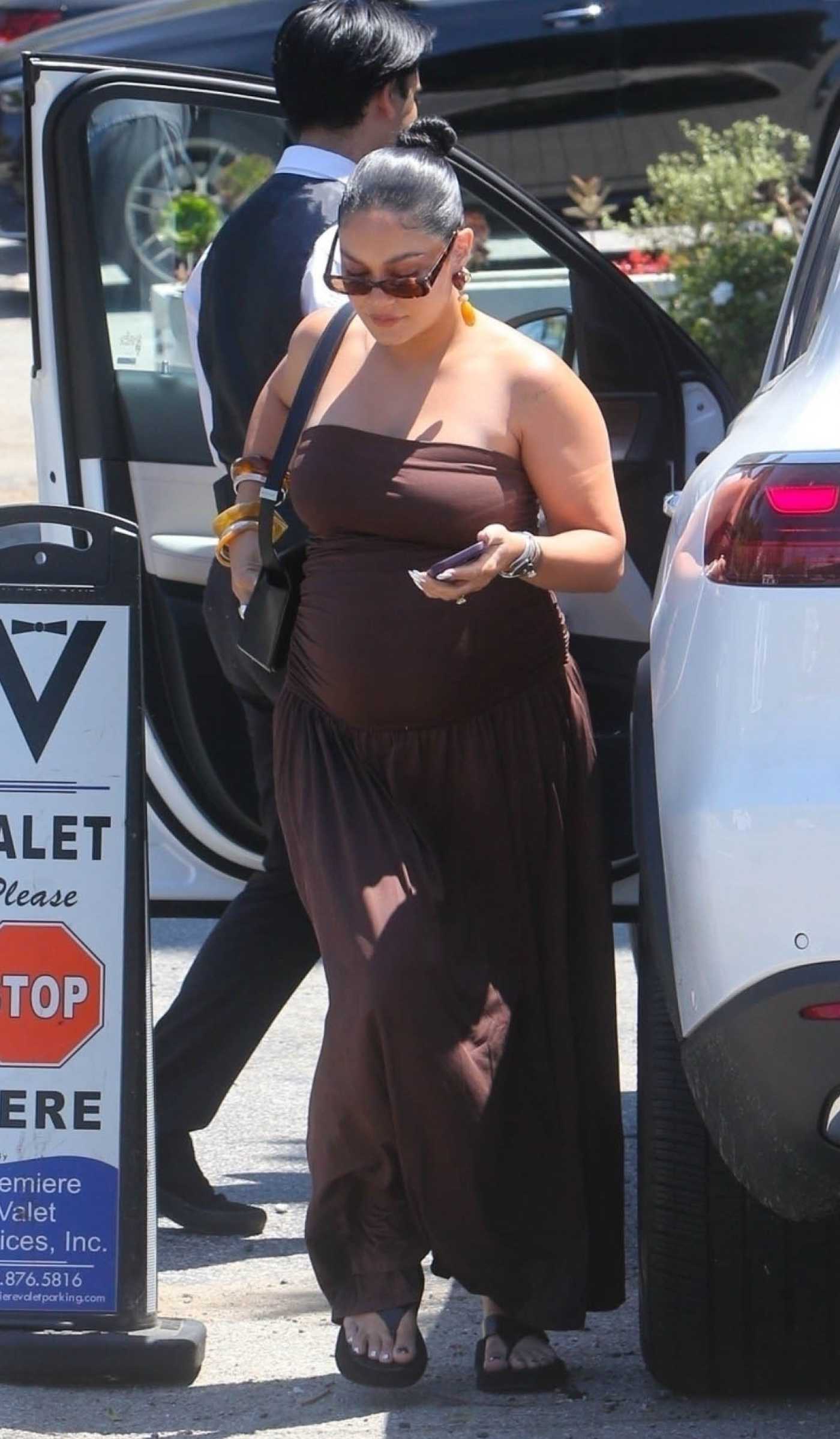 Vanessa Hudgens in a Brown Dress Was Seen Out in Brentwood 08/10/2025