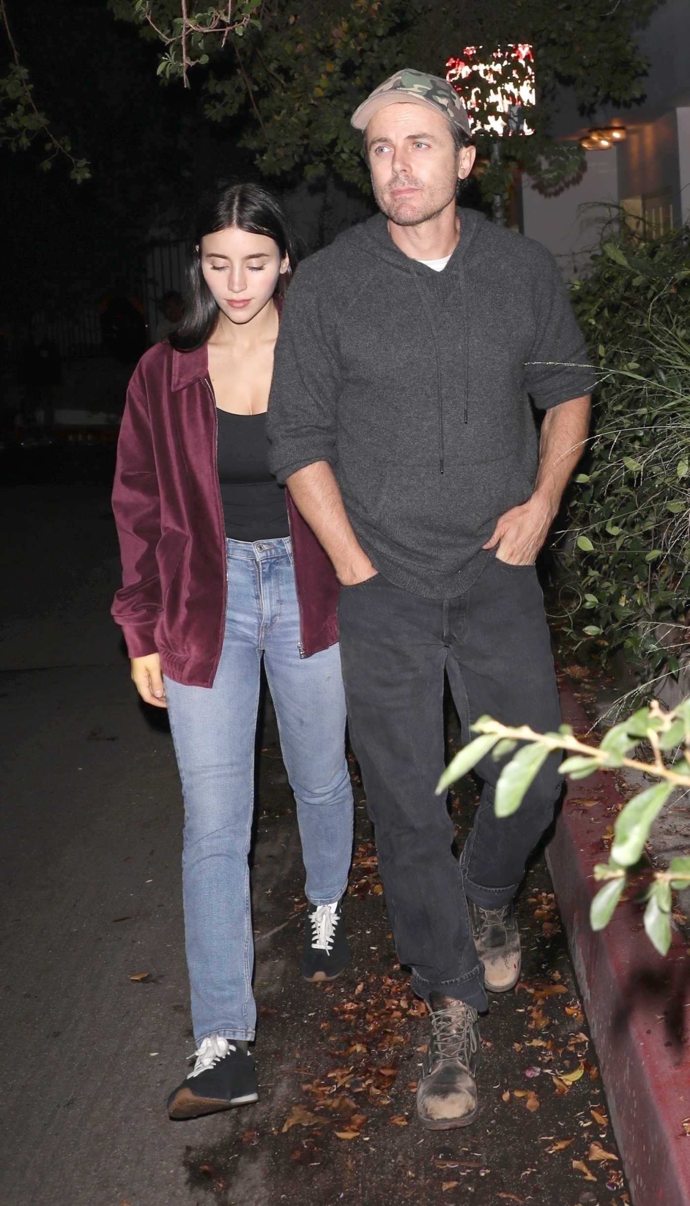 Caylee Cowan in a Black Sneakers Departs with Casey Affleck Vas J Morgan's House Party in Los Angeles 09/19/2025