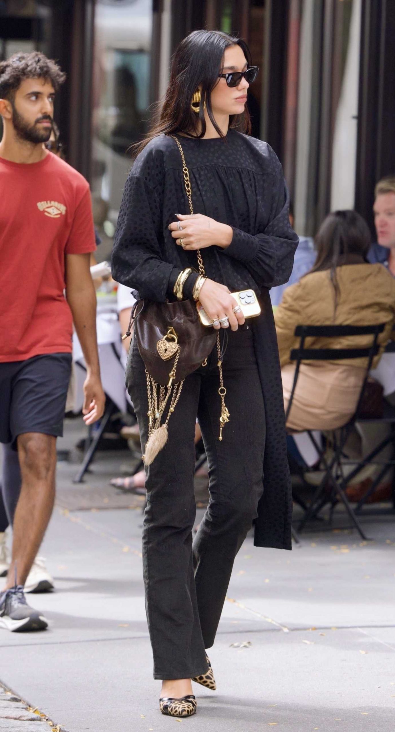 Dua Lipa in a Black Blouse Was Seen Out in the West Village in New York City 09/16/2025