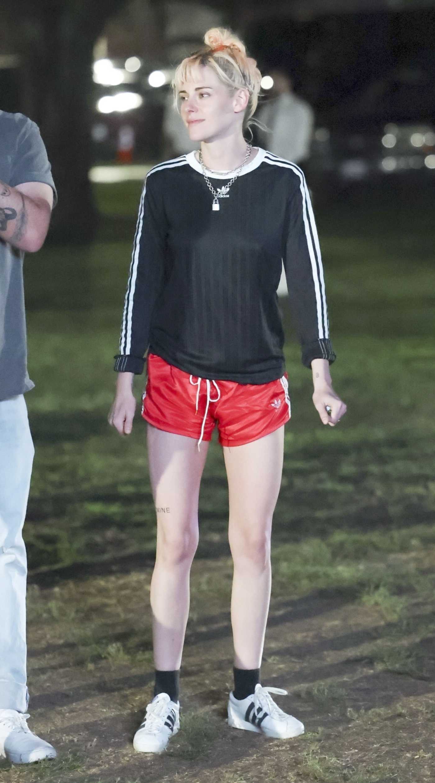Kristen Stewart in a Red Adidas Shorts Arrives at the Oasis Concert in Pasadena 09/07/2025
