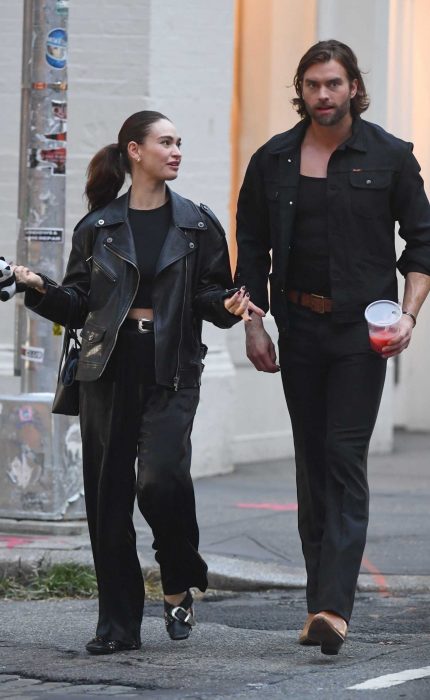 Lily James in a Black Leather Jacket