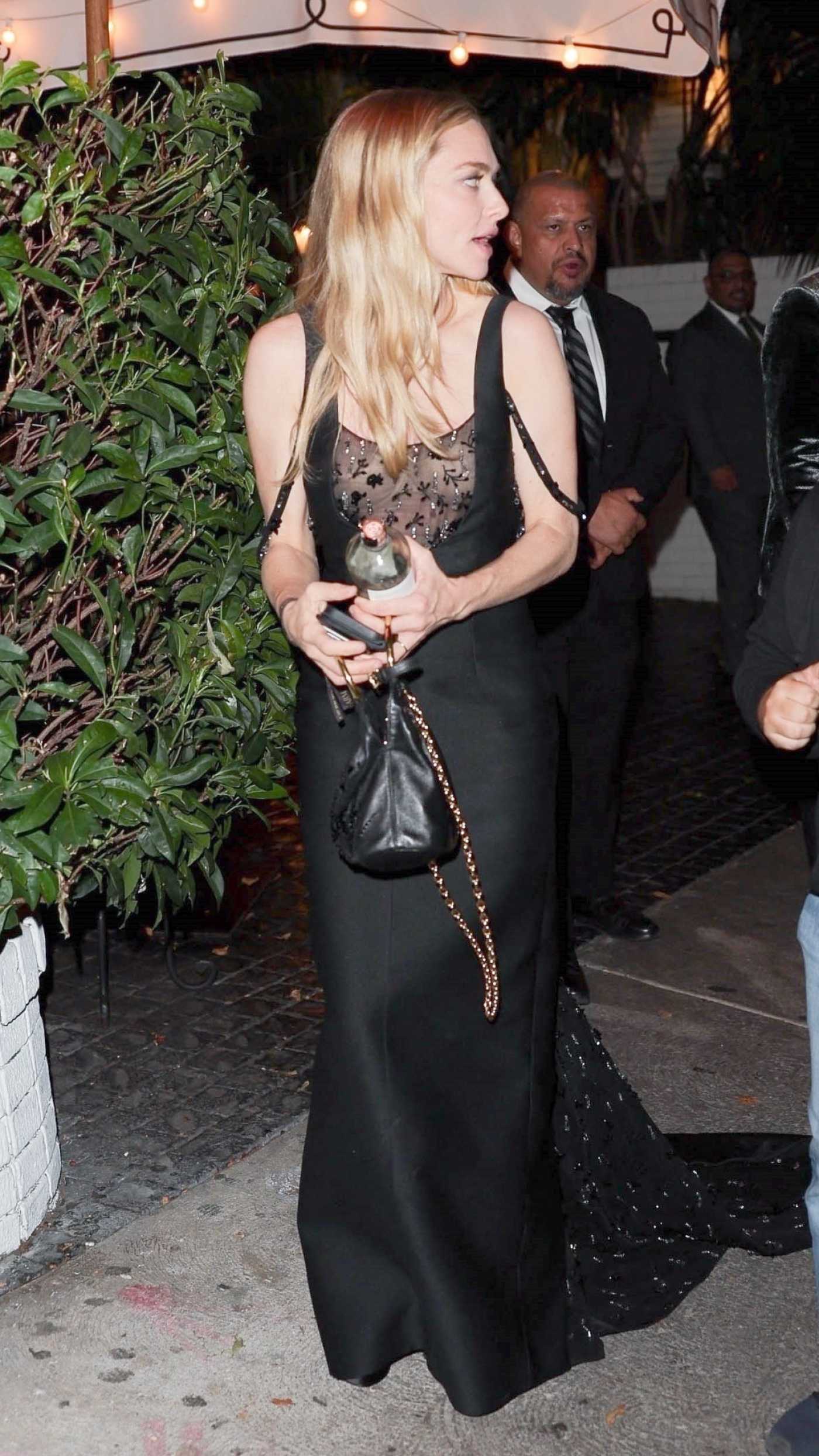 Amanda Seyfried in a Black Dress Arrives at the Armani Academy Museum Gala Afterparty at Chateau Marmont in West Hollywood 10/18/2025