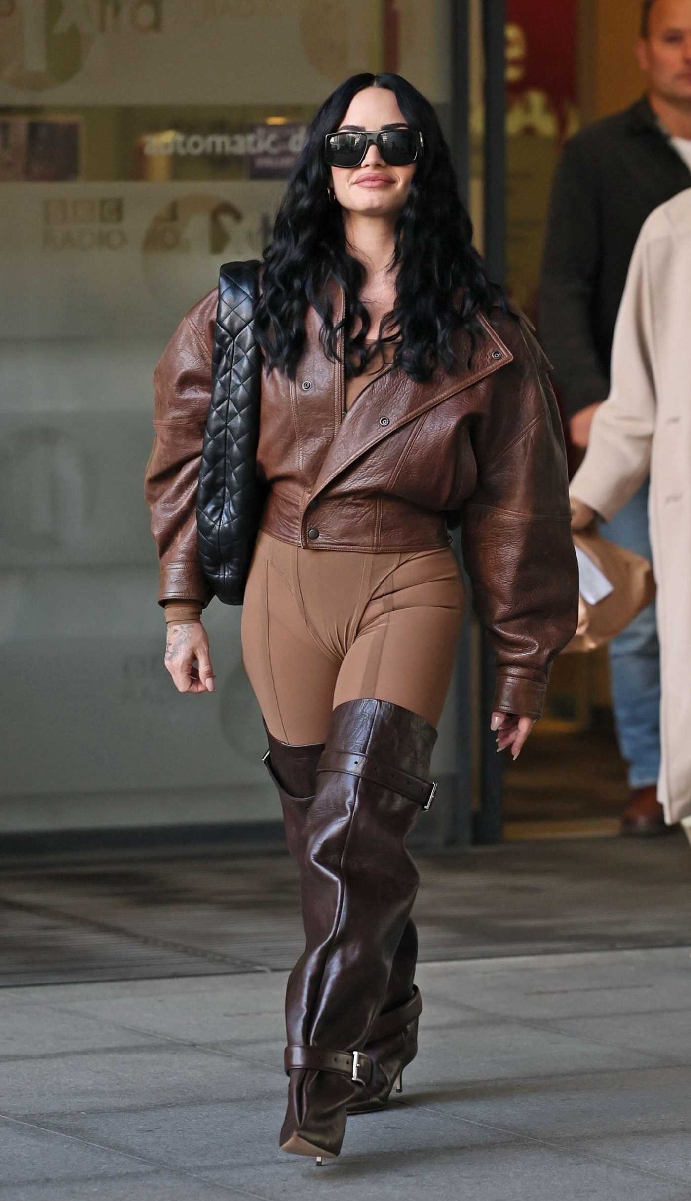 Demi Lovato in a Brown Leather Jacket Was Seen Out in London 09/30/2025