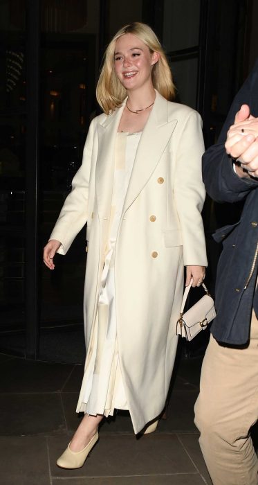 Elle Fanning in a Beige Coat