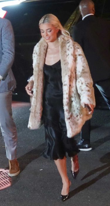 Olivia Dunne in an Animal Print Fur Coat