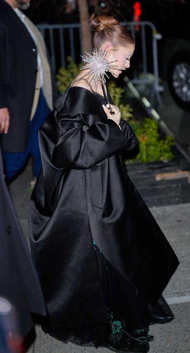 Ariana Grande in a Black Trench Coat