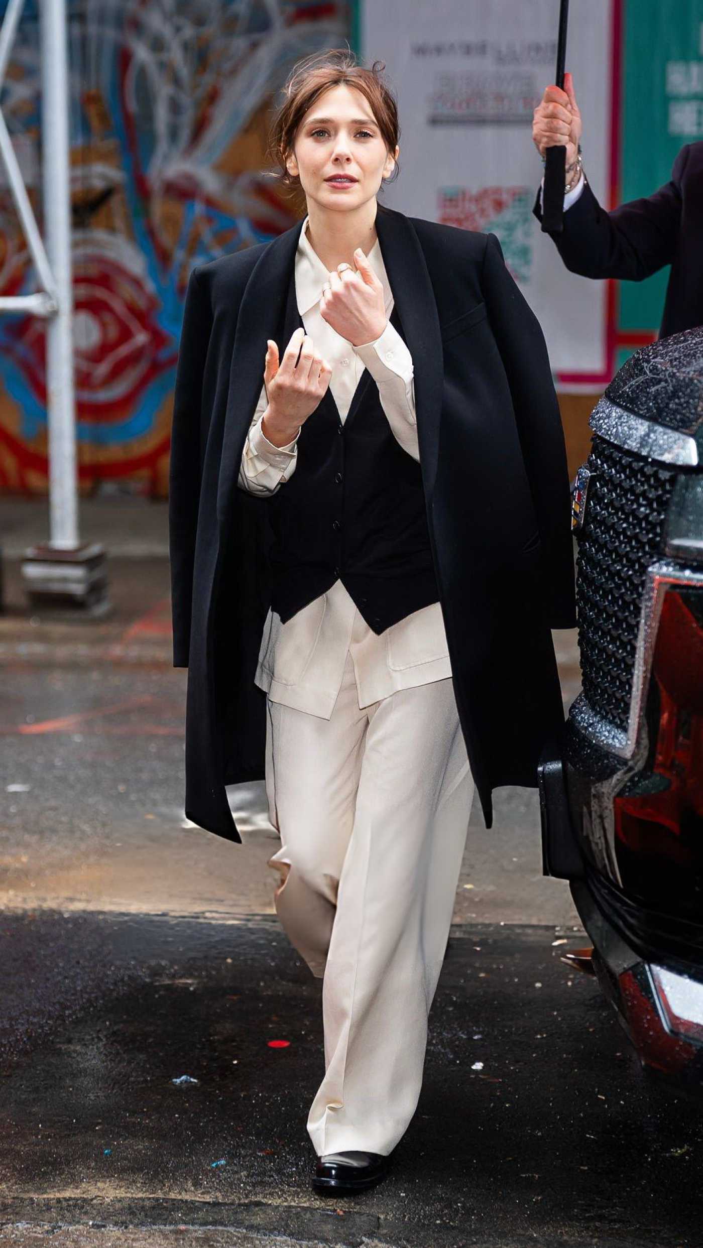 Elizabeth Olsen in a Black Coat Was Seen Out in Midtown in New York 11/10/2025