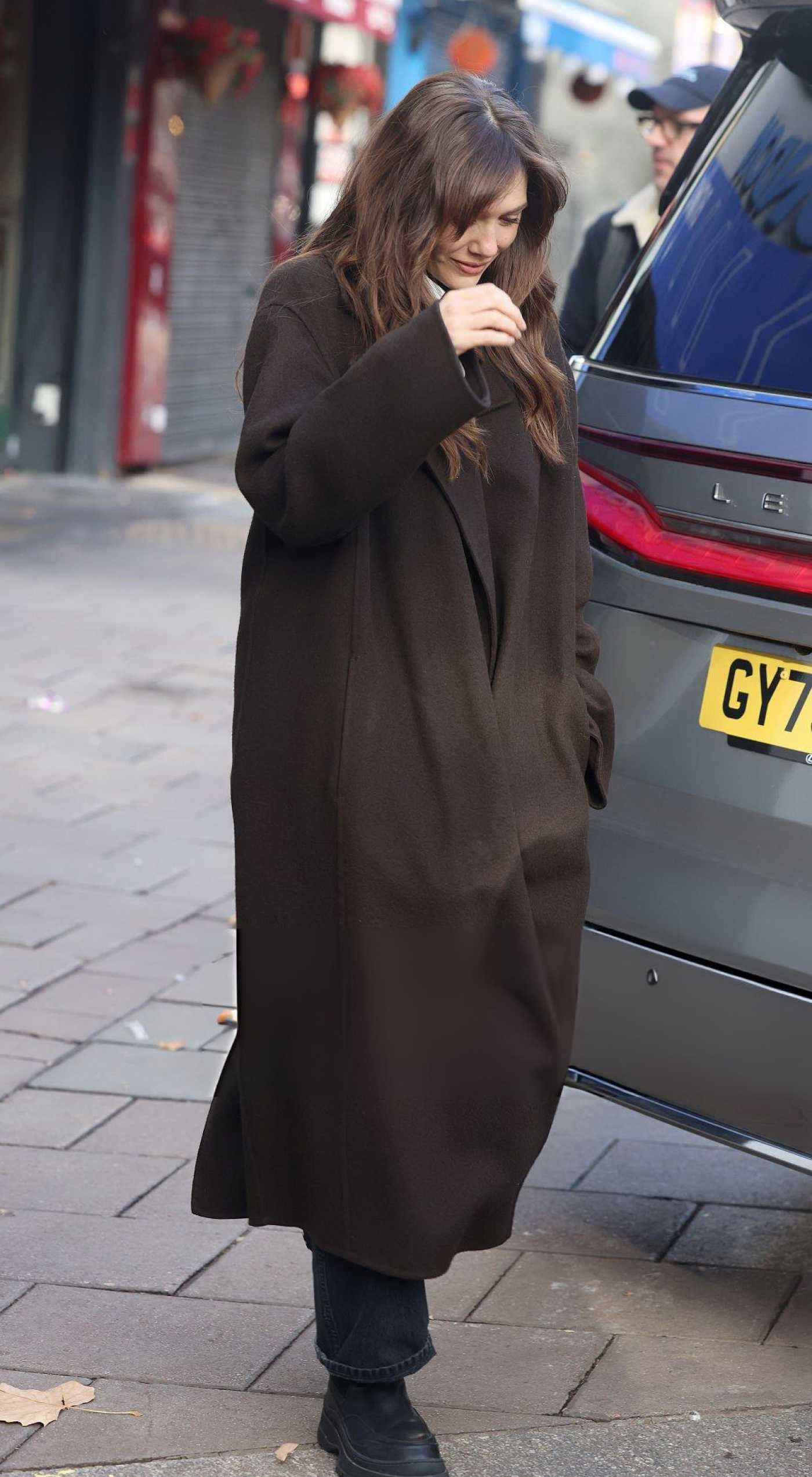 Elizabeth Olsen in a Brown Coat Leaves the Heart Breakfast Radio Studios in London 11/18/2025