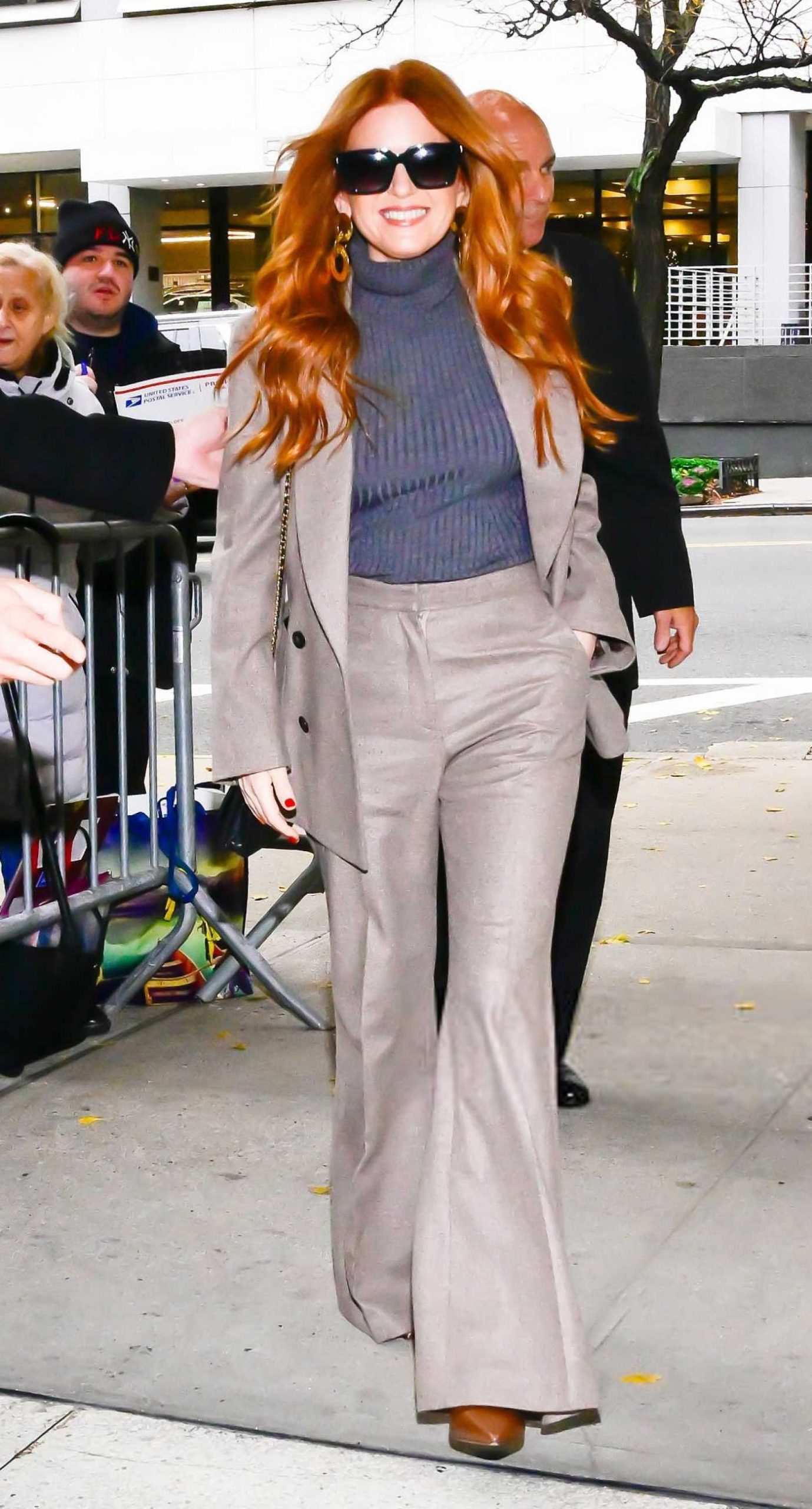 Isla Fisher in a Grey Turtleneck Was Seen Outside CBS Studios in New York City 11/10/2025