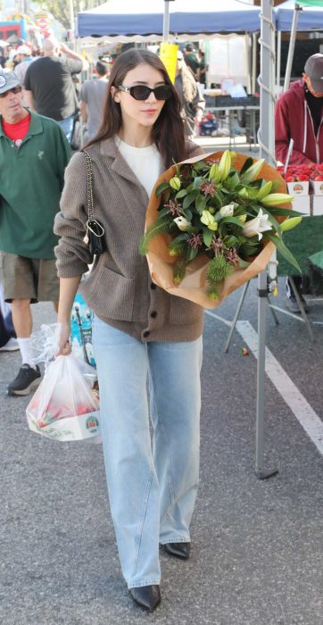 Caylee Cowan in a Tan Cardigan
