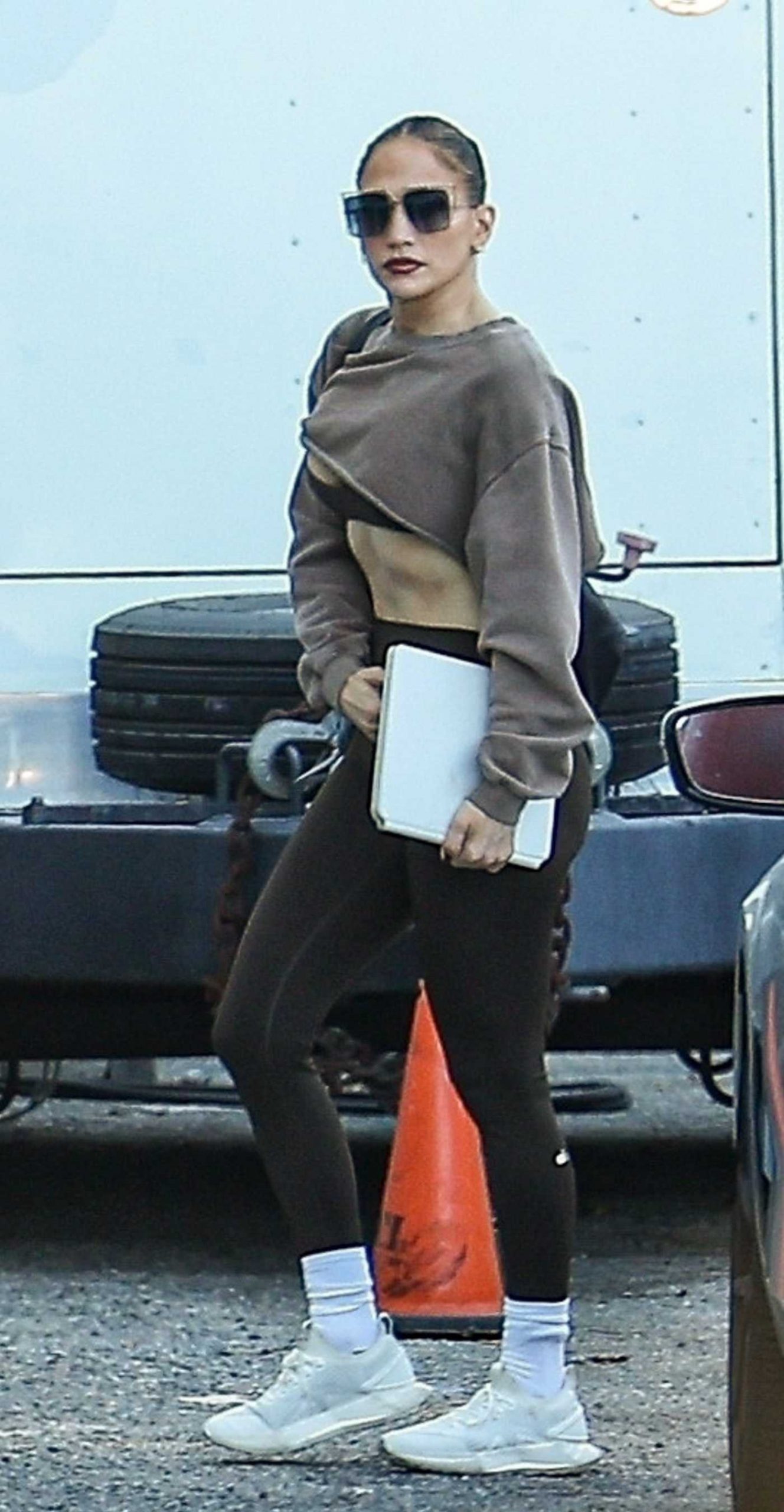 Jennifer Lopez in a White Sneakers Leaves a Studio Session in Los Angeles 12/09/2025