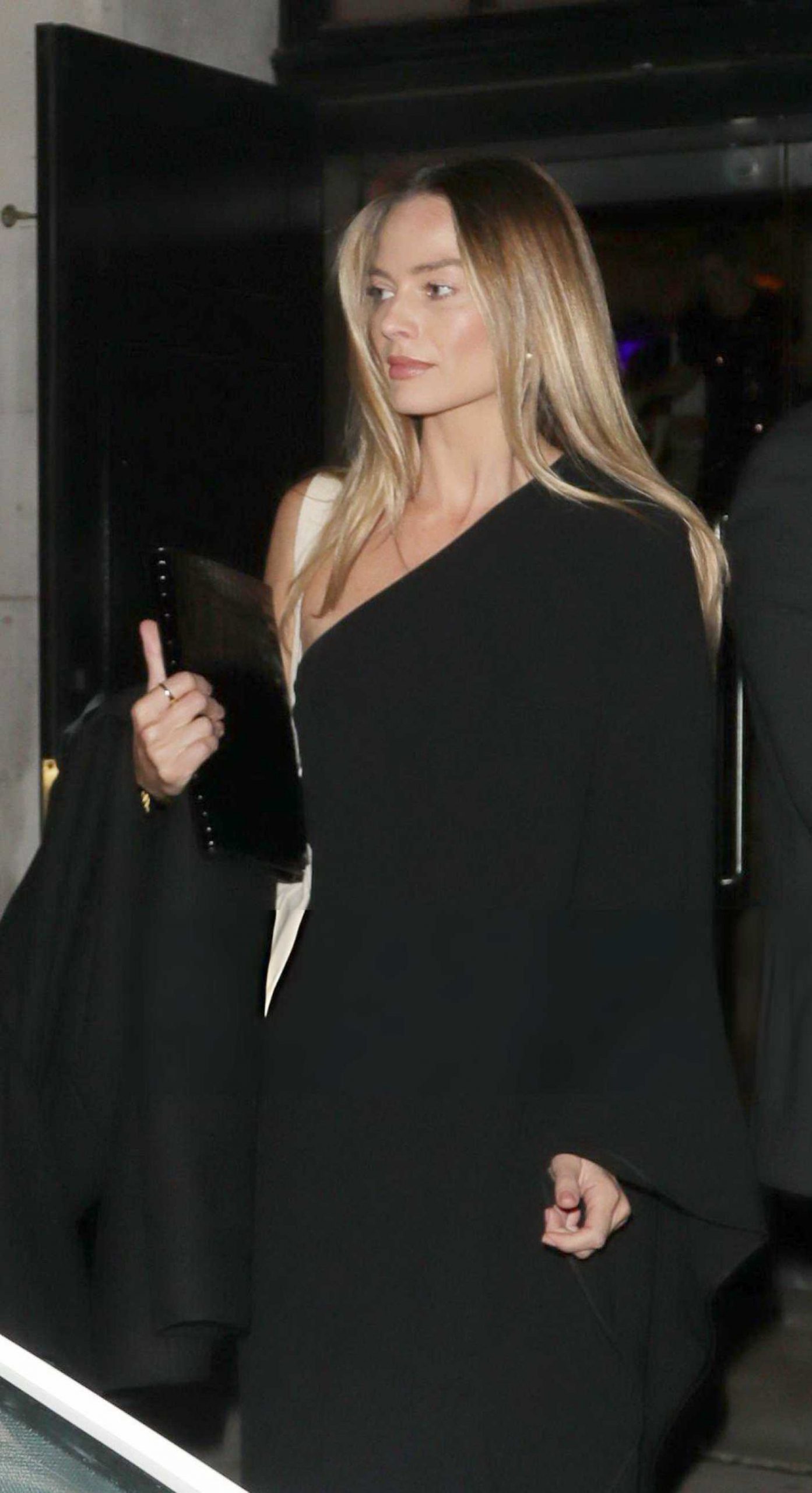 Margot Robbie in a Black Dress Leaves the War Child Gala Dinner in London 12/05/2025