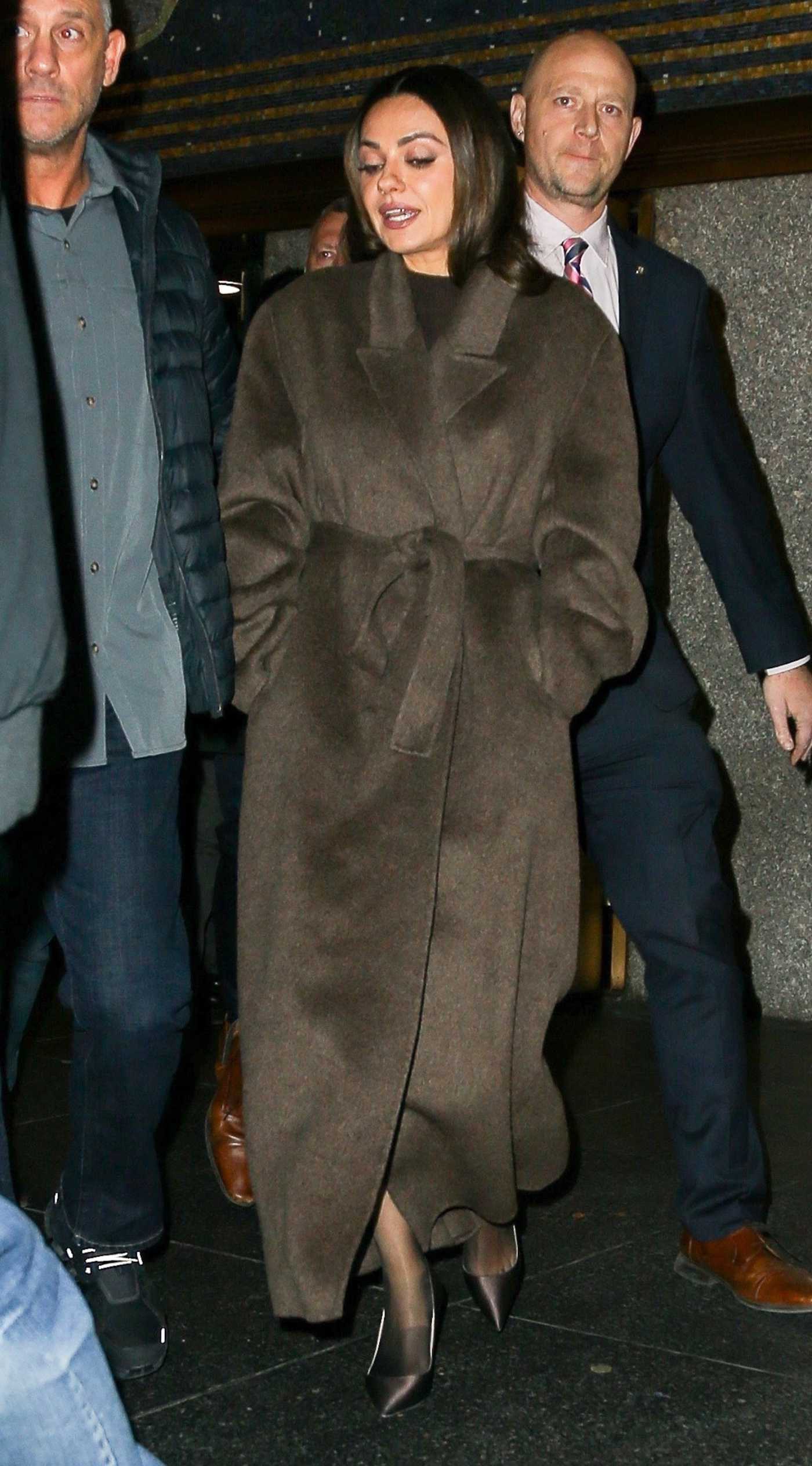 Mila Kunis in a Brown Coat Leaves The Tonight Show Starring Jimmy Fallon in New York 12/08/2025