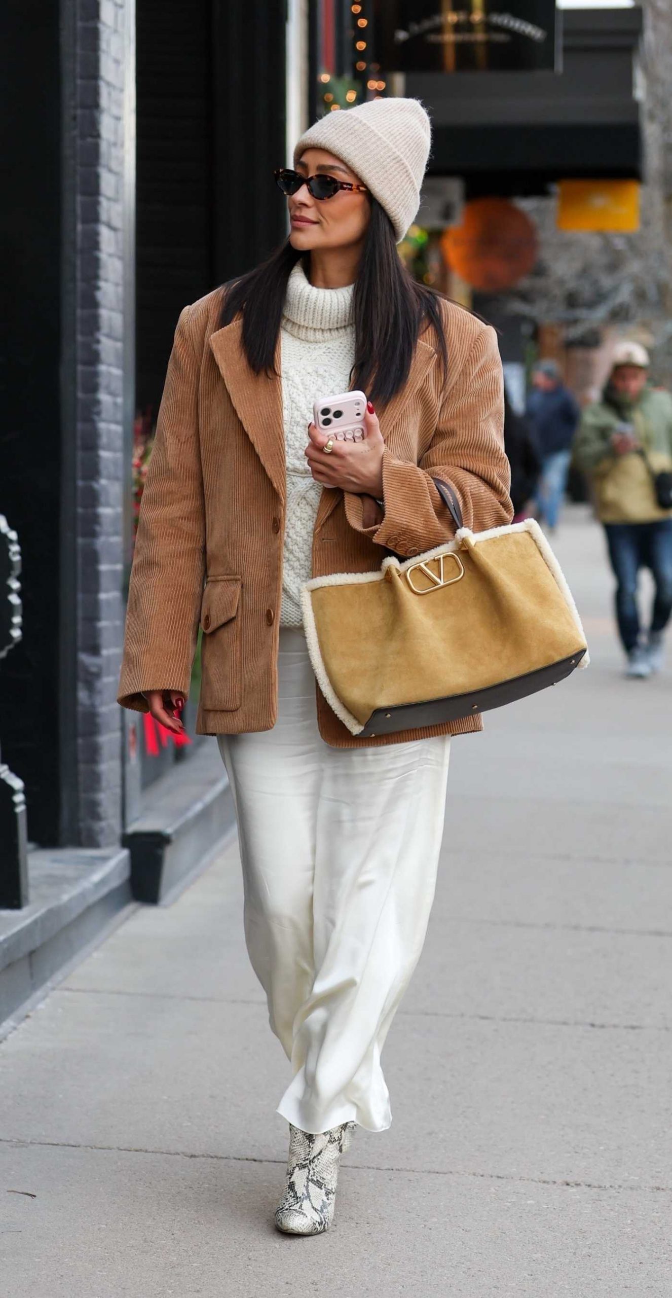 Shay Mitchell in a Beige Beanie Hat Was Seen Out in Aspen 12/18/2025