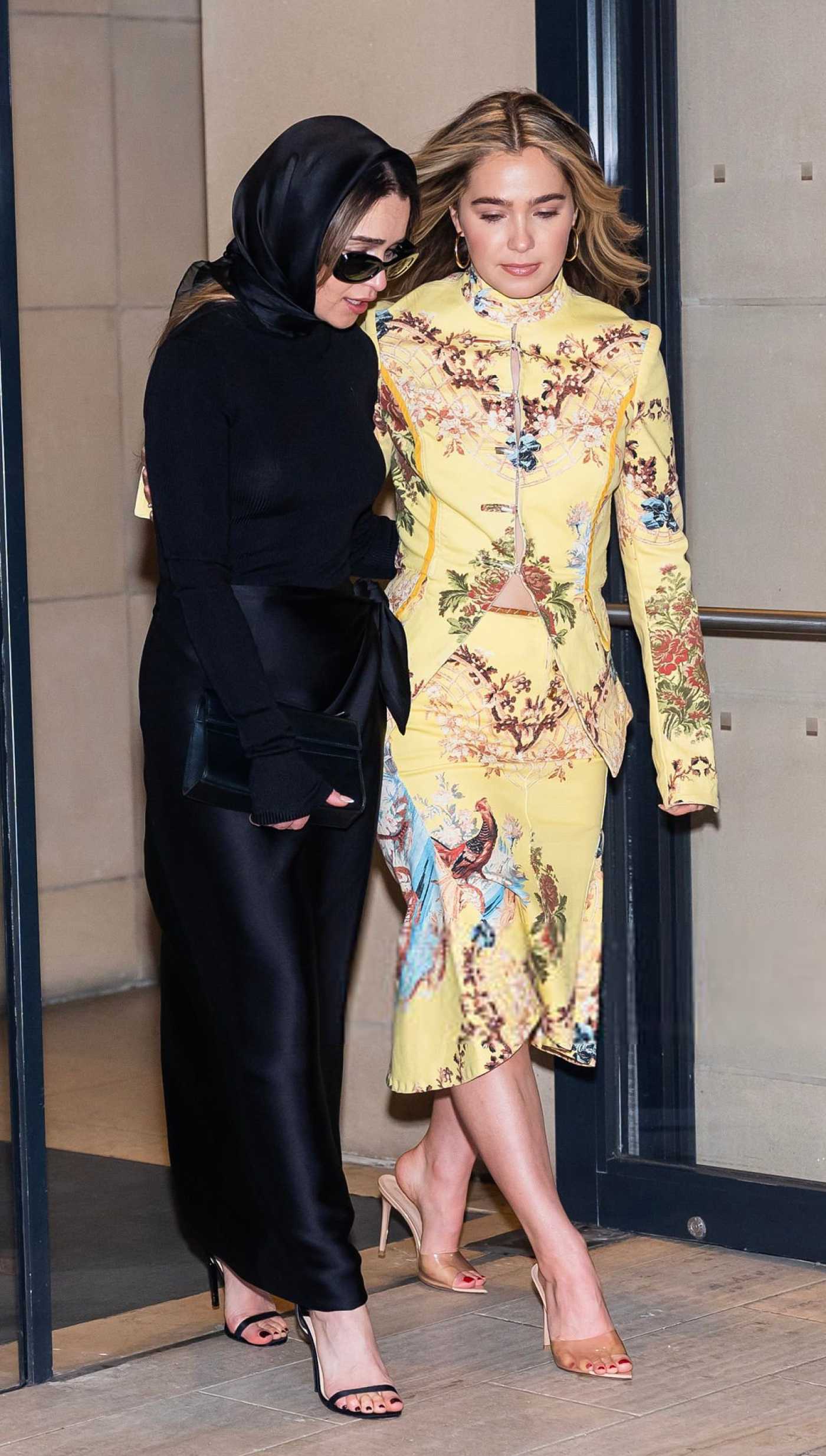 Emilia Clarke in a Black Ensemble Was Seen Out with Haley Lu Richardson on Times Square in New York City 01/15/2026