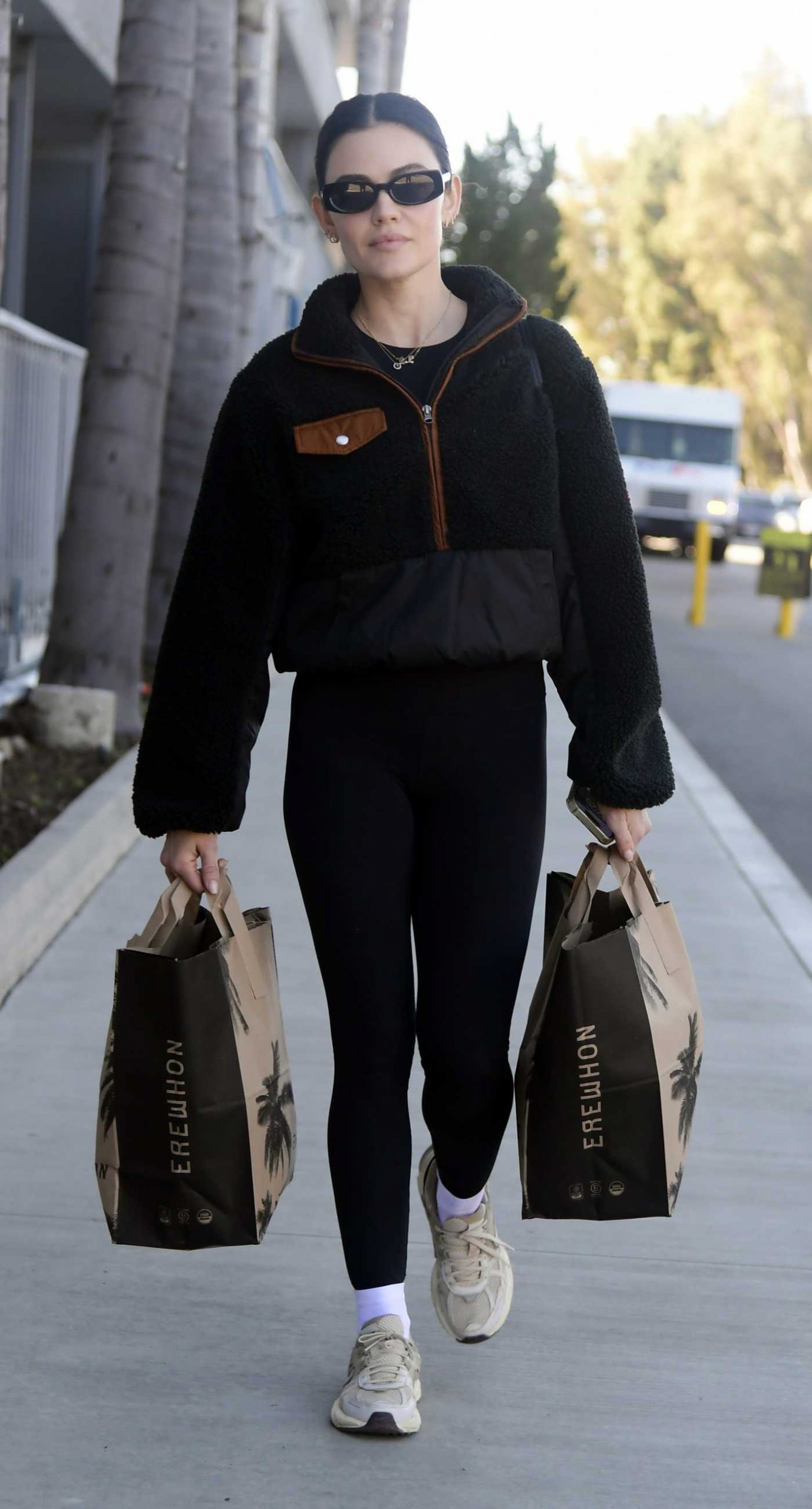 Lucy Hale in a Black Leggings Goes Shopping at Erewhon in Los Angeles 01/09/2026