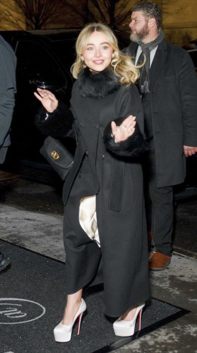 Sabrina Carpenter in a Black Coat