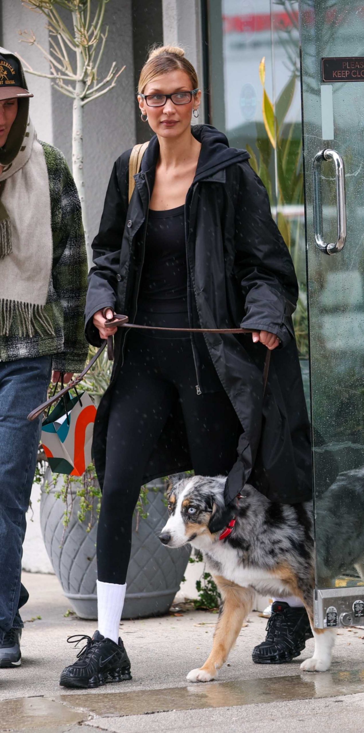 Bella Hadid in a Black Trench Coat Visits a Marijuana Dispensary in Los Angeles 02/18/2026